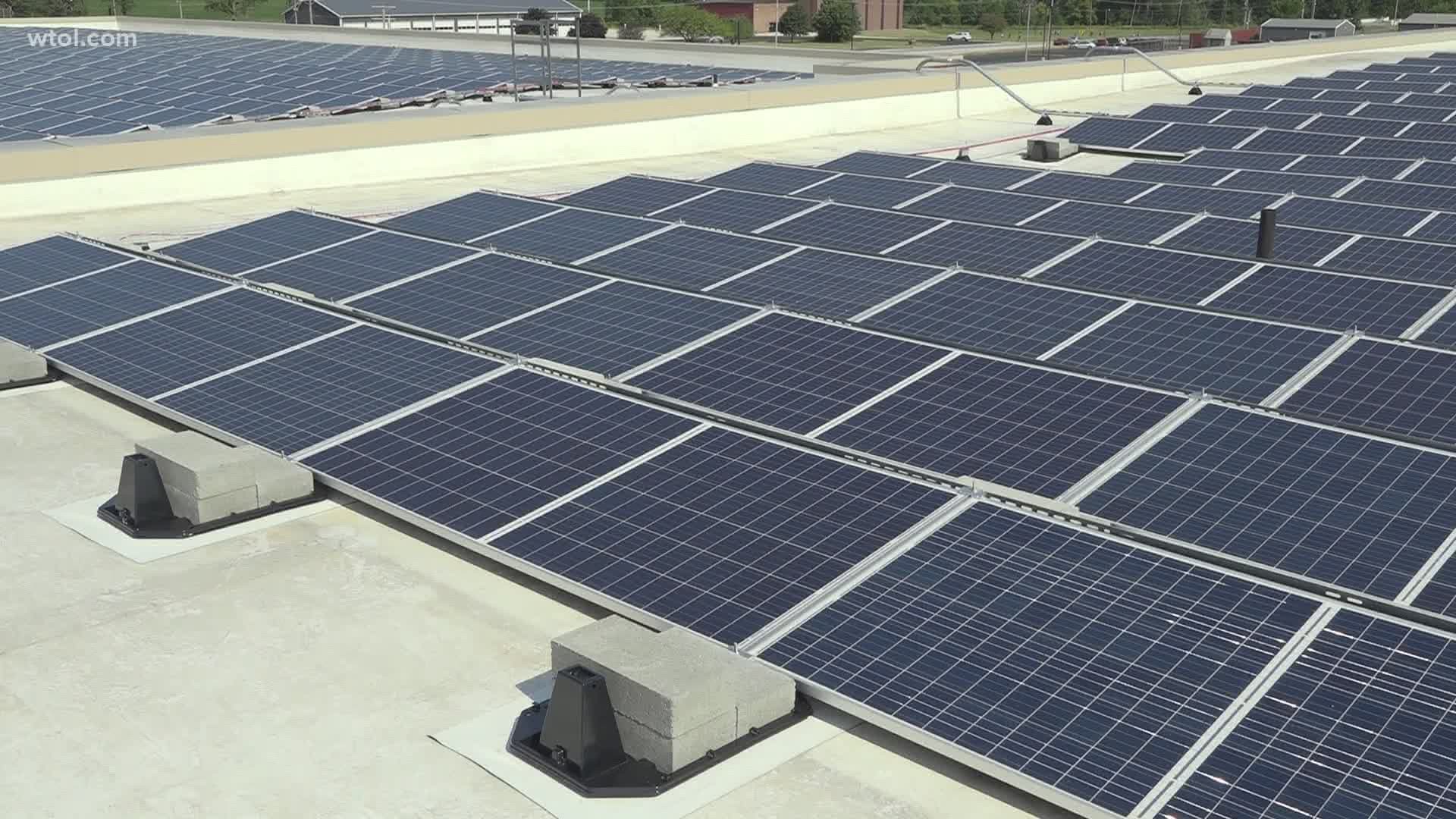 The nearly 1,400 solar panels are expected to generate just less than half of the school districts energy need