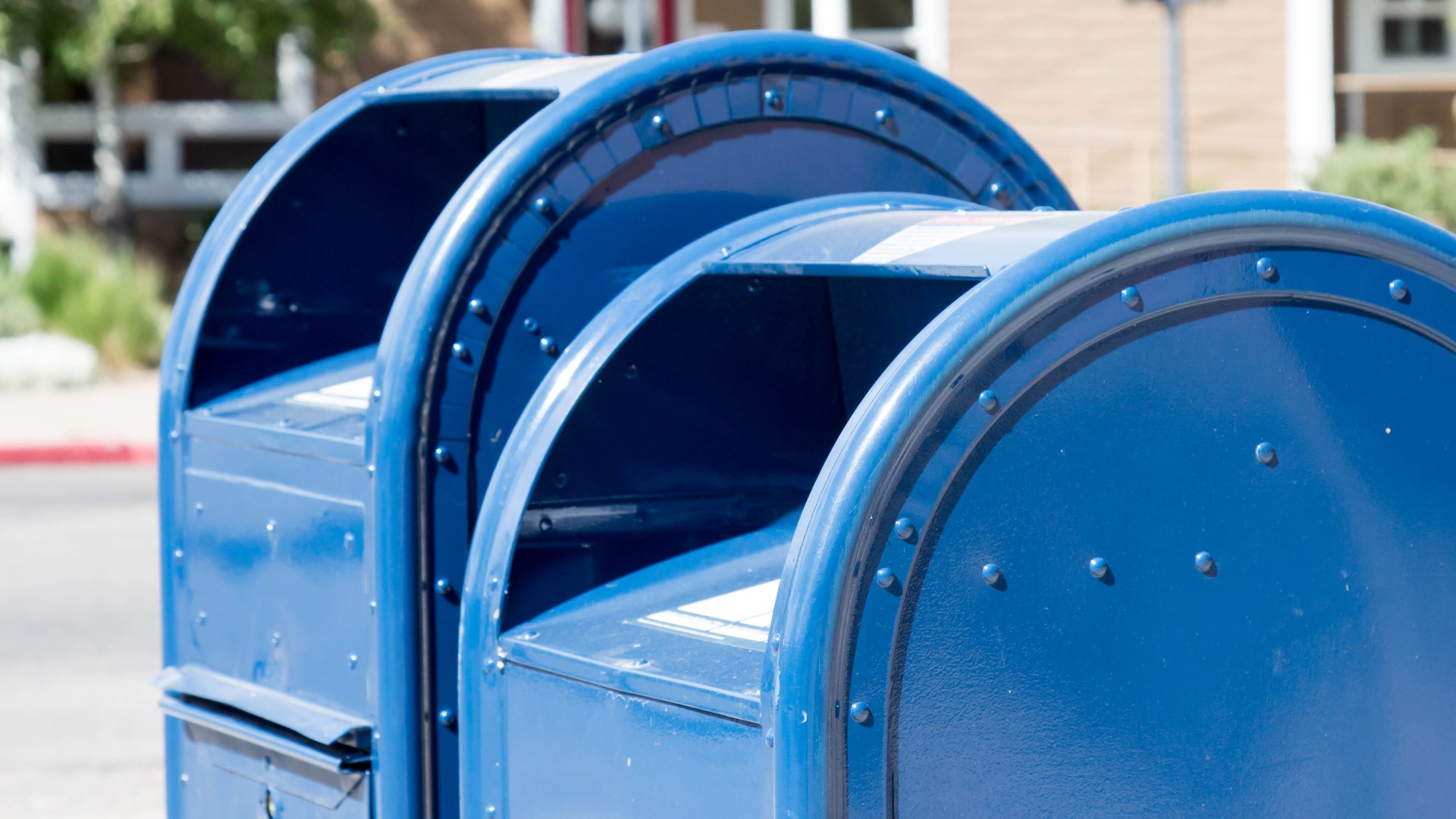 'I've never witnessed or experienced anything like that before the holidays, tax season.' Some USPS customers report finding blue mailboxes filled to the top.