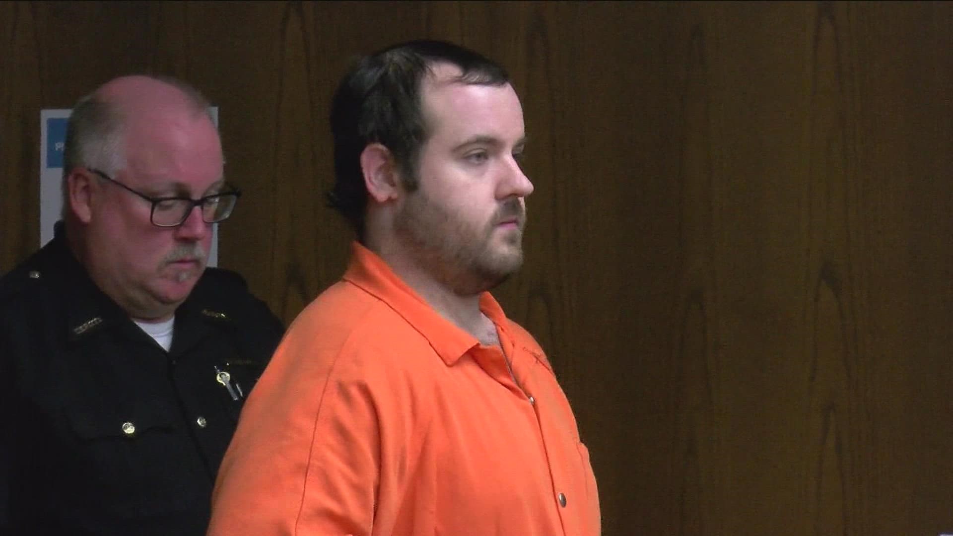 Travis Lewton is accused of strangling his mother and setting her body on fire.