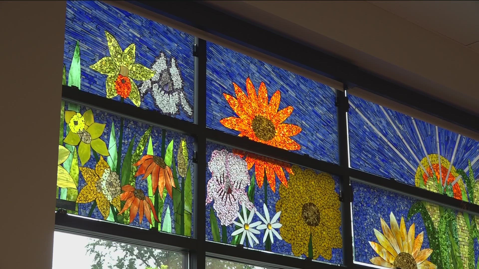 Senior citizen artists contributed to a new stained glass installation at the senior center.