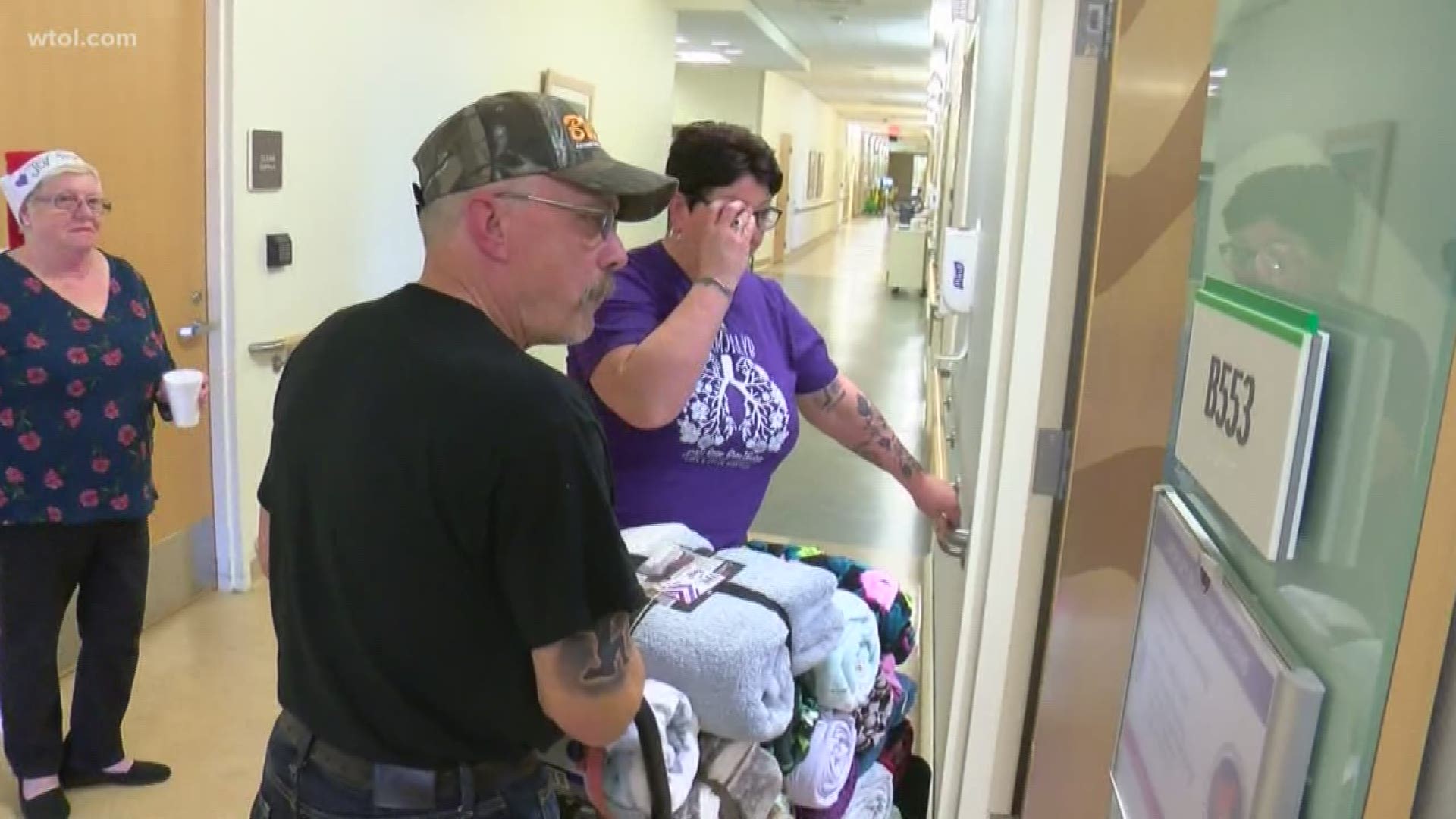 After a family lost their daughter to cystic fibrosis, they are spending the holidays at the hospital giving out some warmth and connecting with patients.