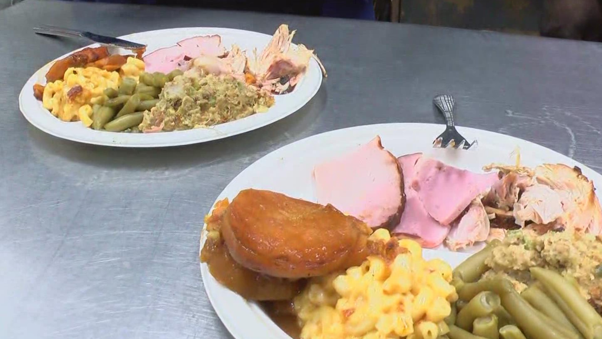 Keith Henry, the owner of O'Henrys Kitchen OnWheels, is cooking for those in need of a holiday dinner. He expects to serve 1,500 free meals Thursday.