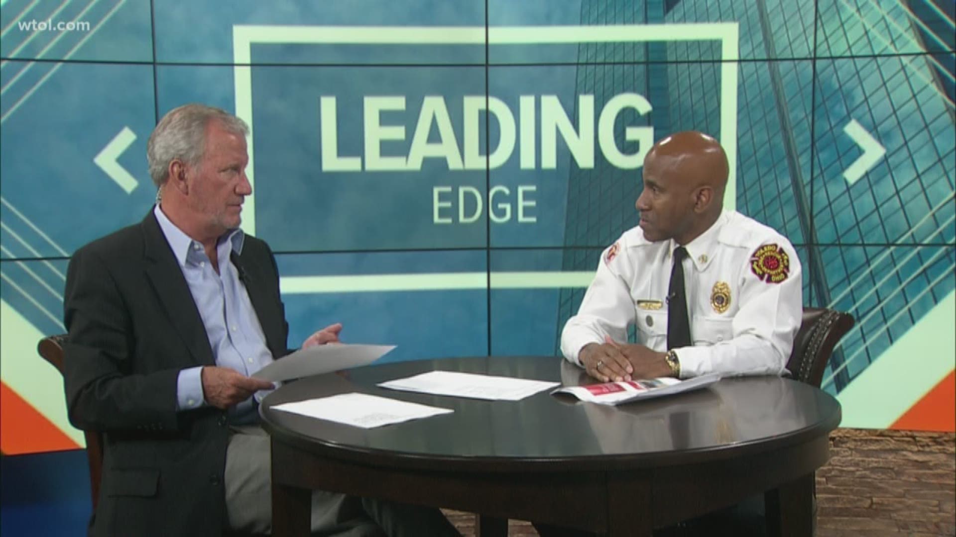 Toledo Fire Chief Brian Byrd discusses the influx of 911 calls at the Leading Edge table.