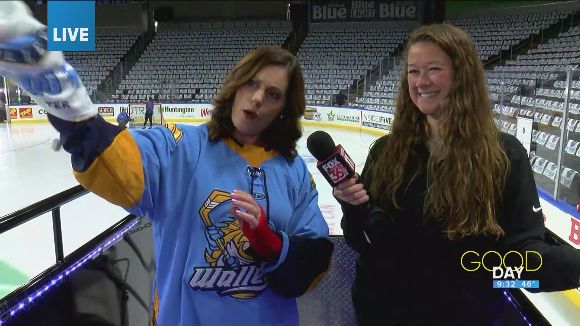 Amanda goes for a ride on an ice resurfacer. 