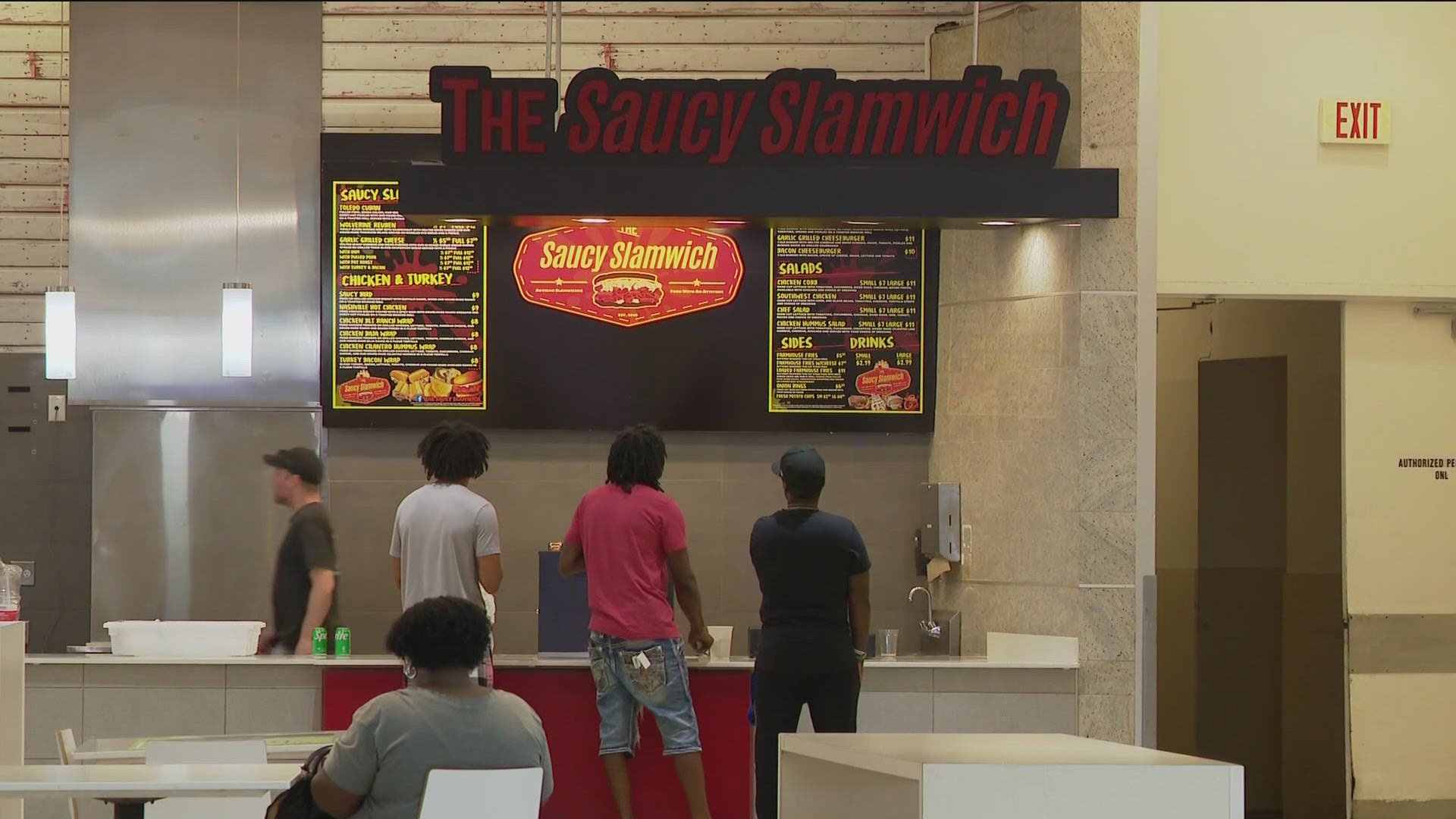 The Saucy Slamwich will continue to serve up American fare through its food trucks while also parked at a new spot inside the mall's food court.