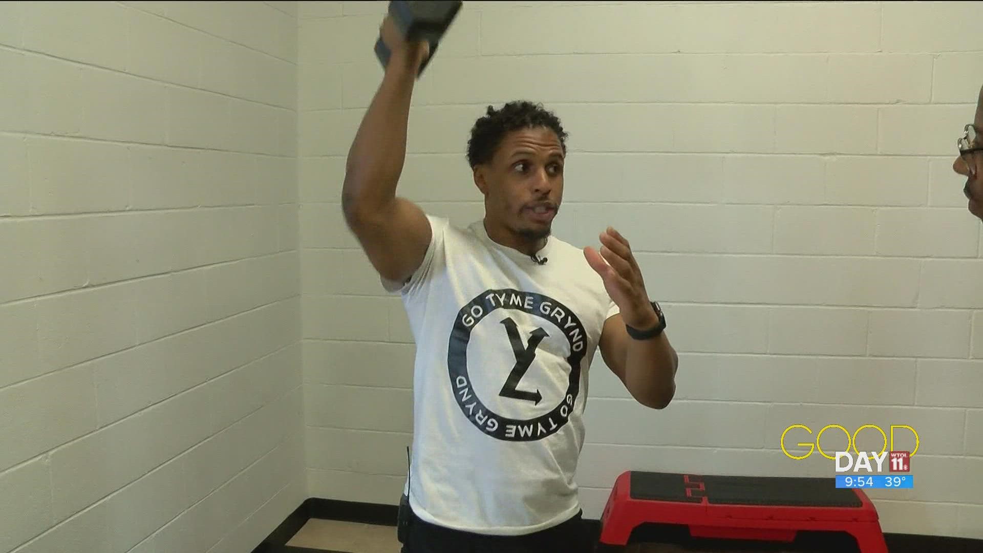 Deandre Gaston of Ohio Go Tyme Grynd Fitness shows Steven some best practice for free weights and lifting.