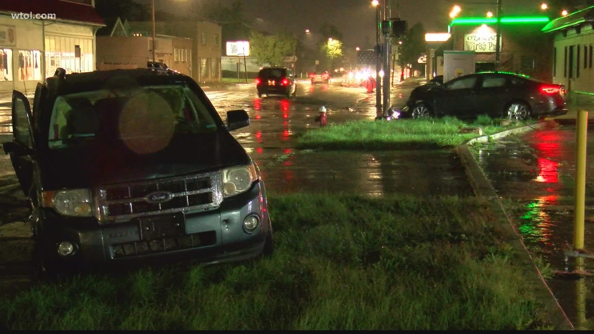 Toledo Police say a car ran a red light