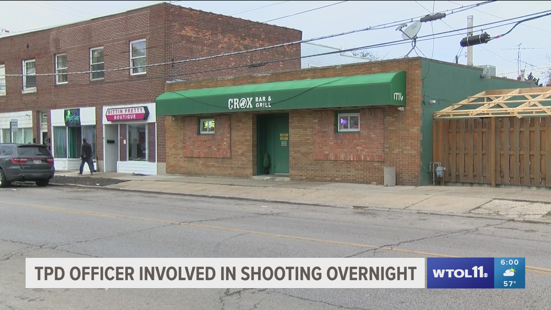 A Toledo officer allegedly saw Michael Thomas, 40, firing a rifle into a bar on Arlington Ave. early Sunday. The officer fired at Thomas, who fled and was arrested.