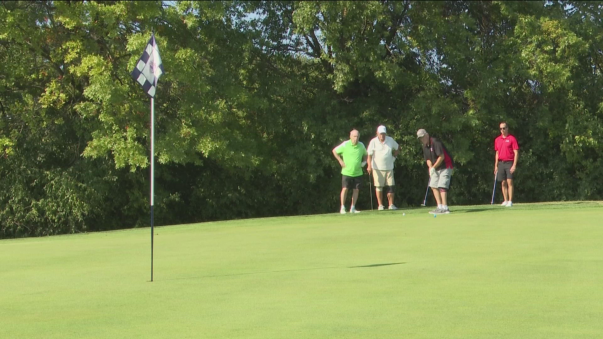 WTOL 11 Chief Meteorologist Chris Vickers and News Operations Manager Paul Kwapich participated in the event on Monday at the Belmont County Club in Perrysburg.