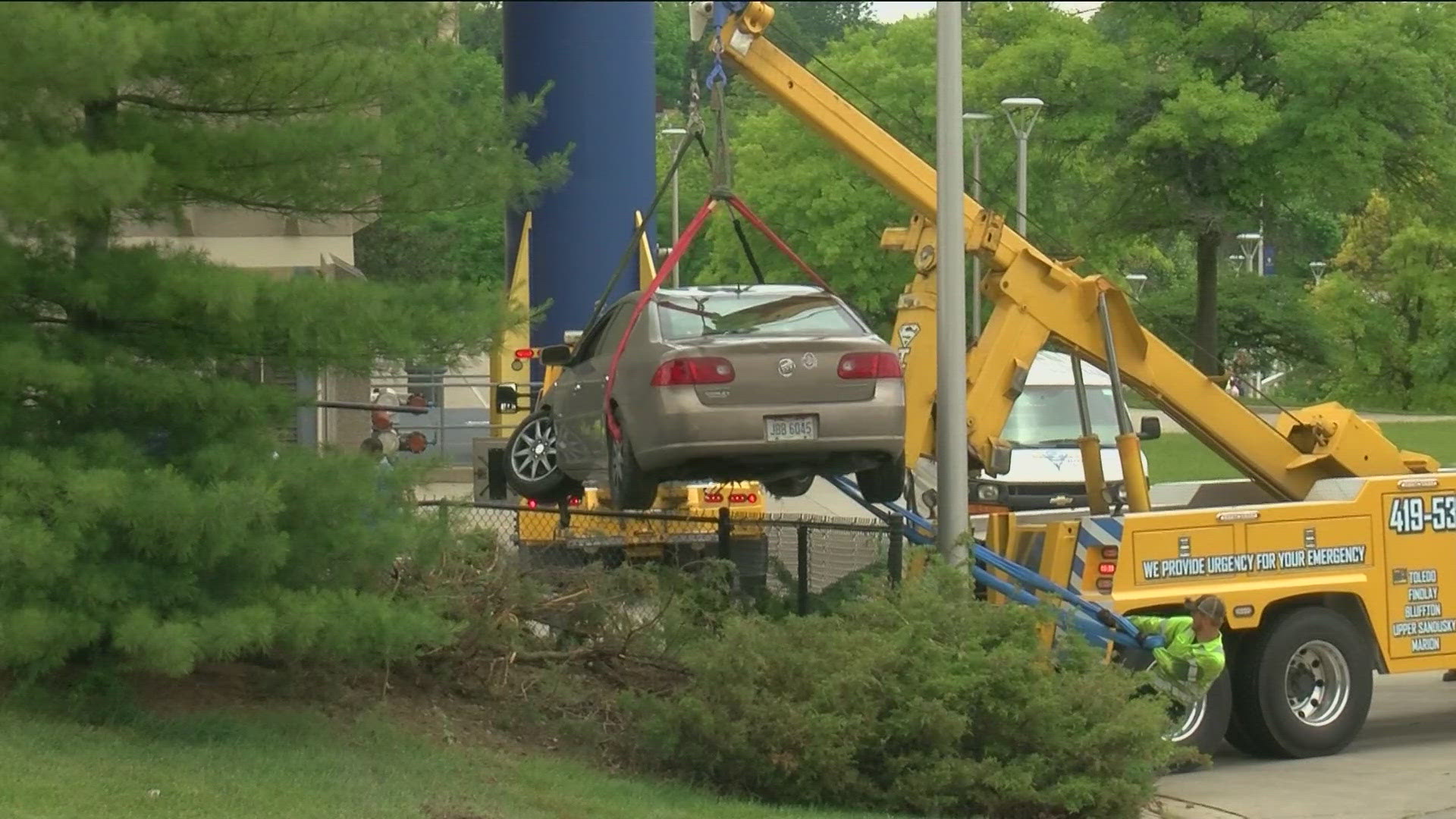 The driver was taken to the hospital with minor injuries. Bedford High School's commencement ceremony began at 2 p.m. as planned after crews secured the scene.