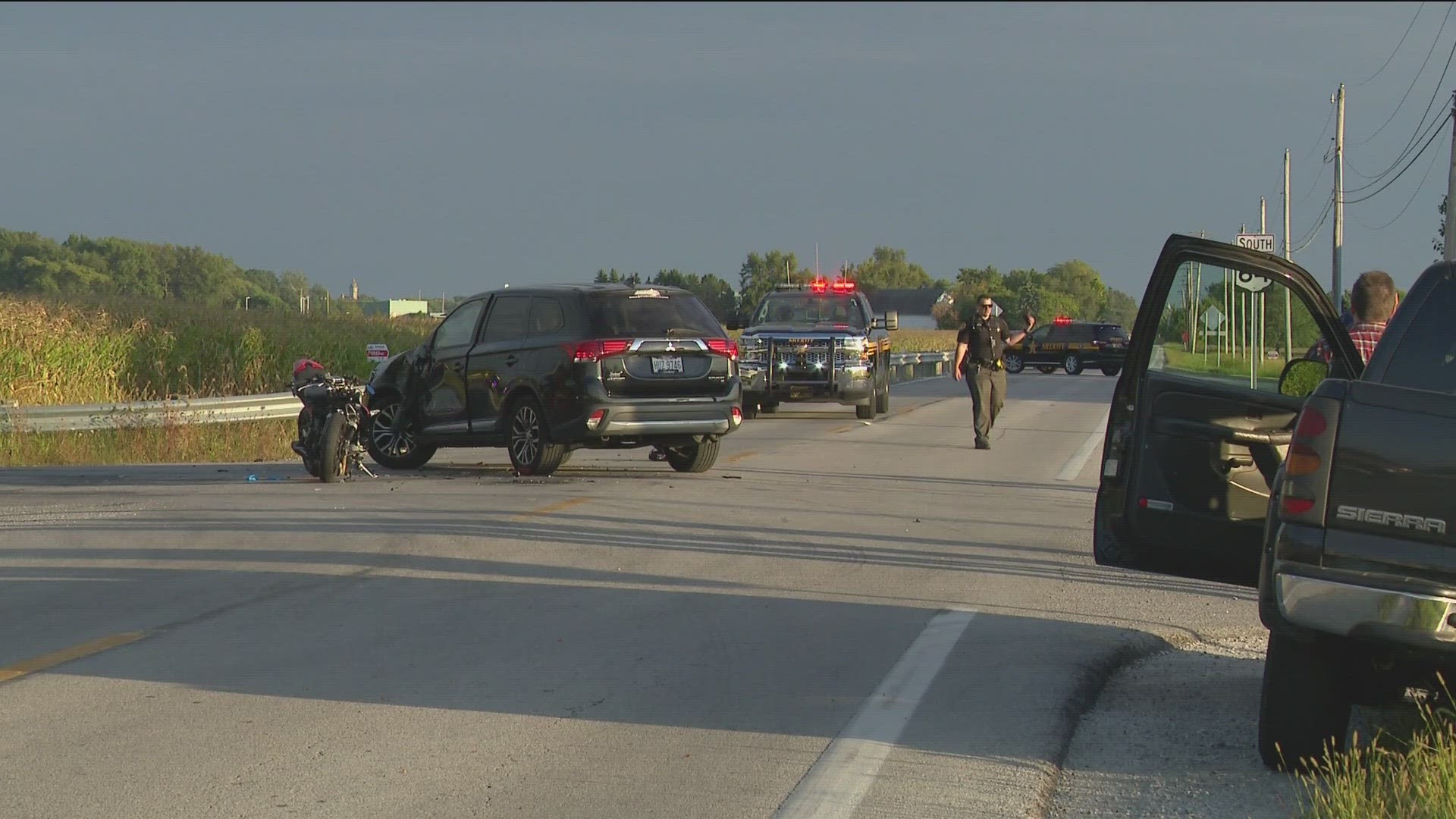 The car crossed the intersection and failed to stop at a stop sign, causing the motorcycle to crash into the car, according to the Wood County Sheriff's Office.