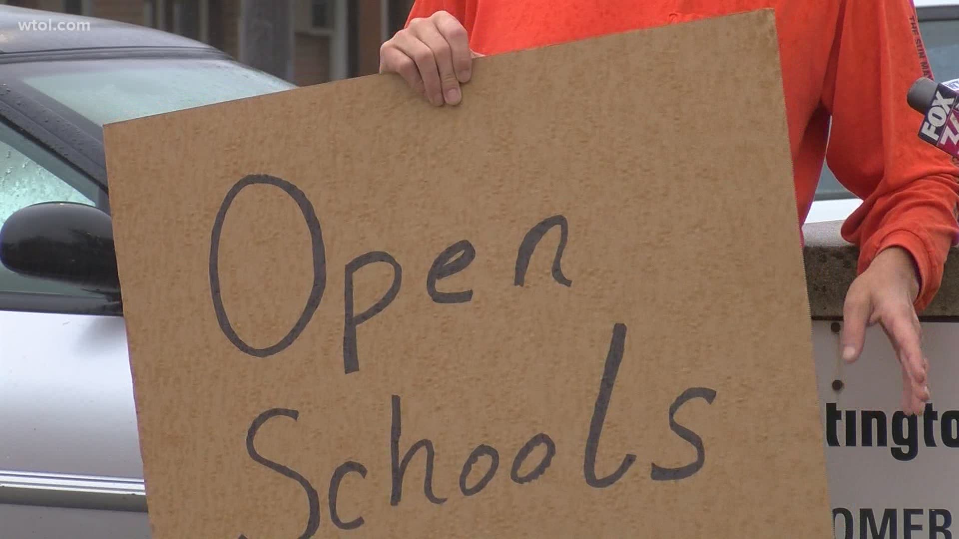 District parents showed up outside of the administrative offices in what they called a 'Rally for Reopening,' to call for a change from virtual learning.