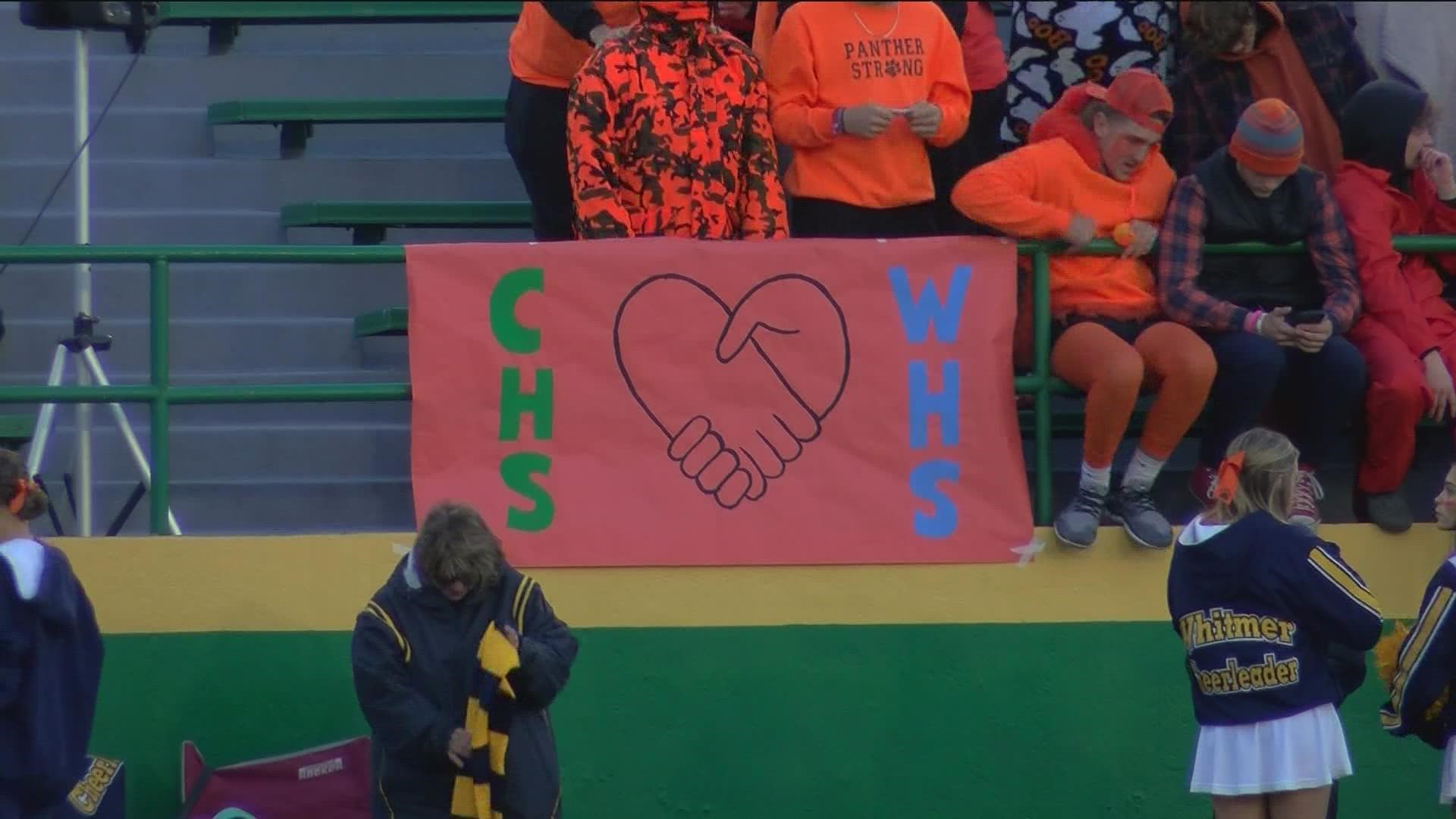 A week after the shooting outside Whitmer High School's football stadium, area high schools wore orange at Friday football games in a unified show of support.