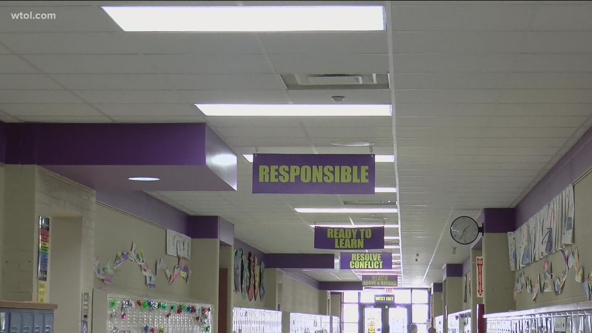 Students in Maumee can trade in a coin they receive for good behavior and get a book of their choosing.