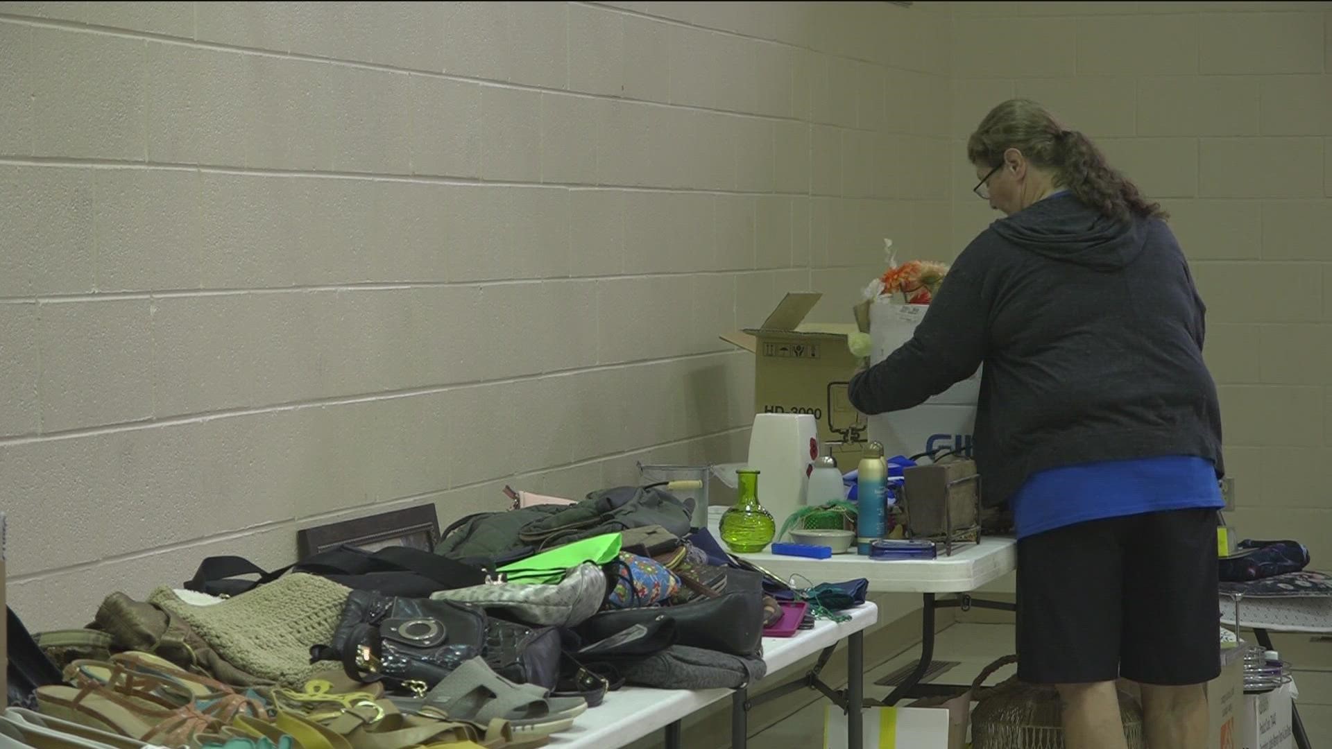 Fairgreen Presbyterian Church partnered with the Red Cross to distribute donated items to families affected by a fire at Hunt Club Apartments in Sylvania on Friday.