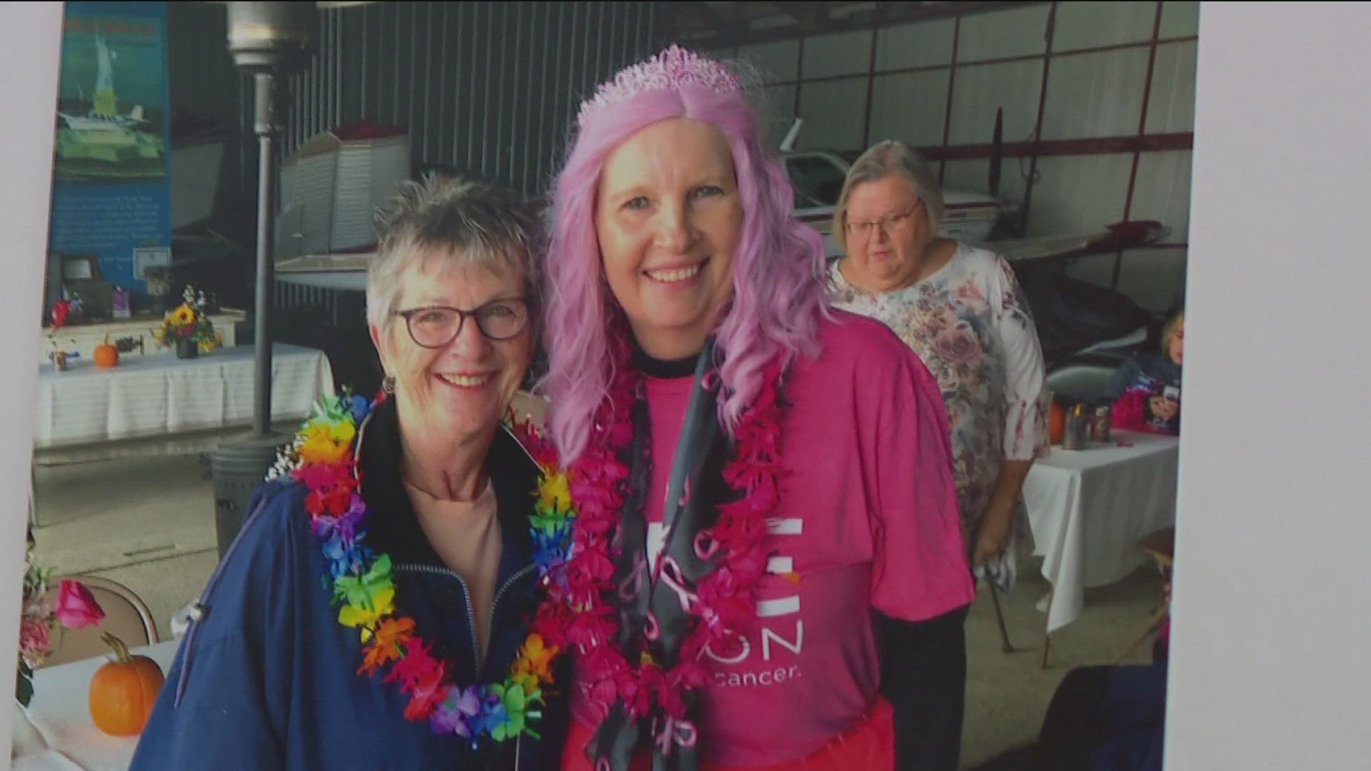 Gretchen Awad with Susan G. Komen Northwest Ohio and Mike Franceus, whose wife is being honored this year, talk about the importance of Race for the Cure.