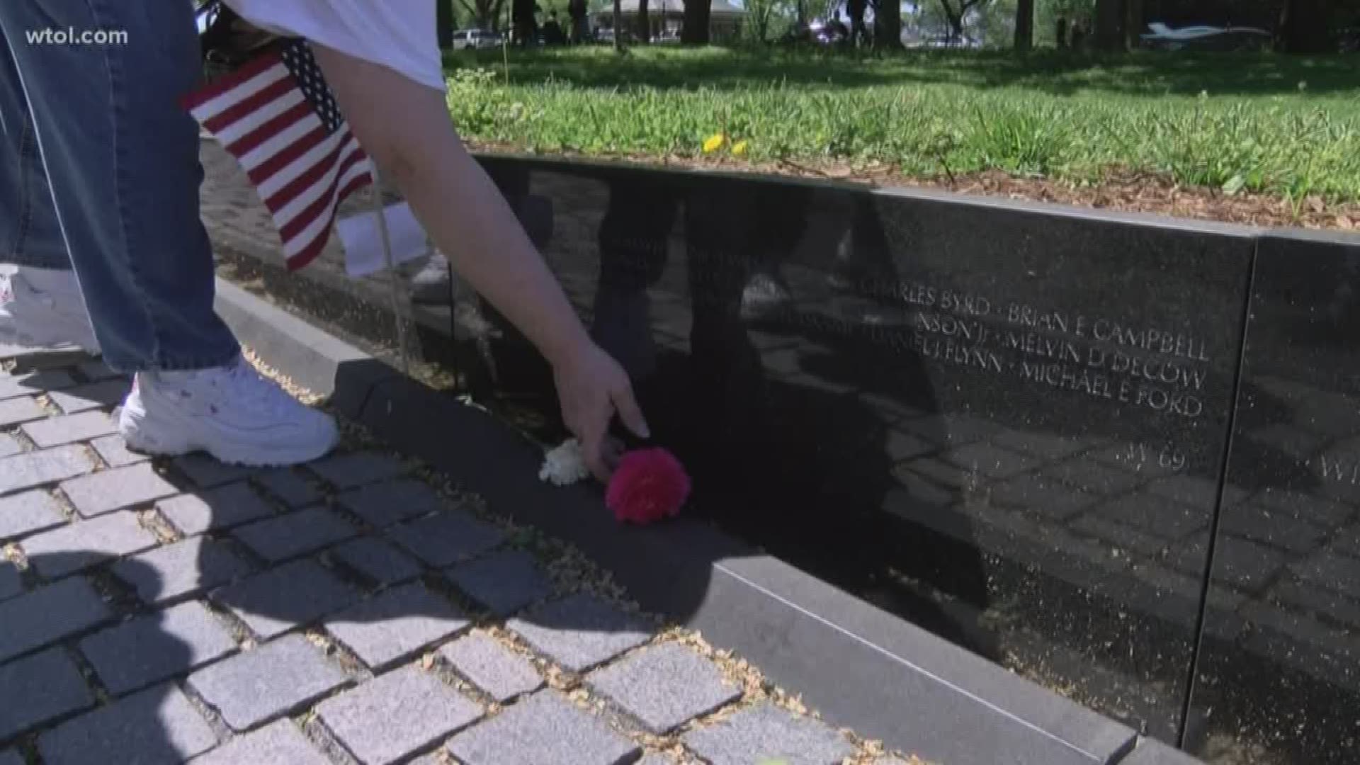 Local Vietnam veterans look for names of their fallen comrades in emotional part of DC trip
