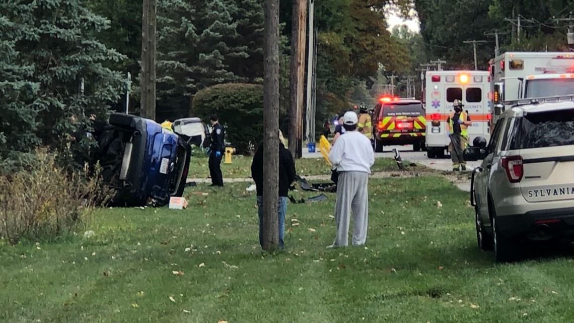 Three people rushed to hospital following two-vehicle crash