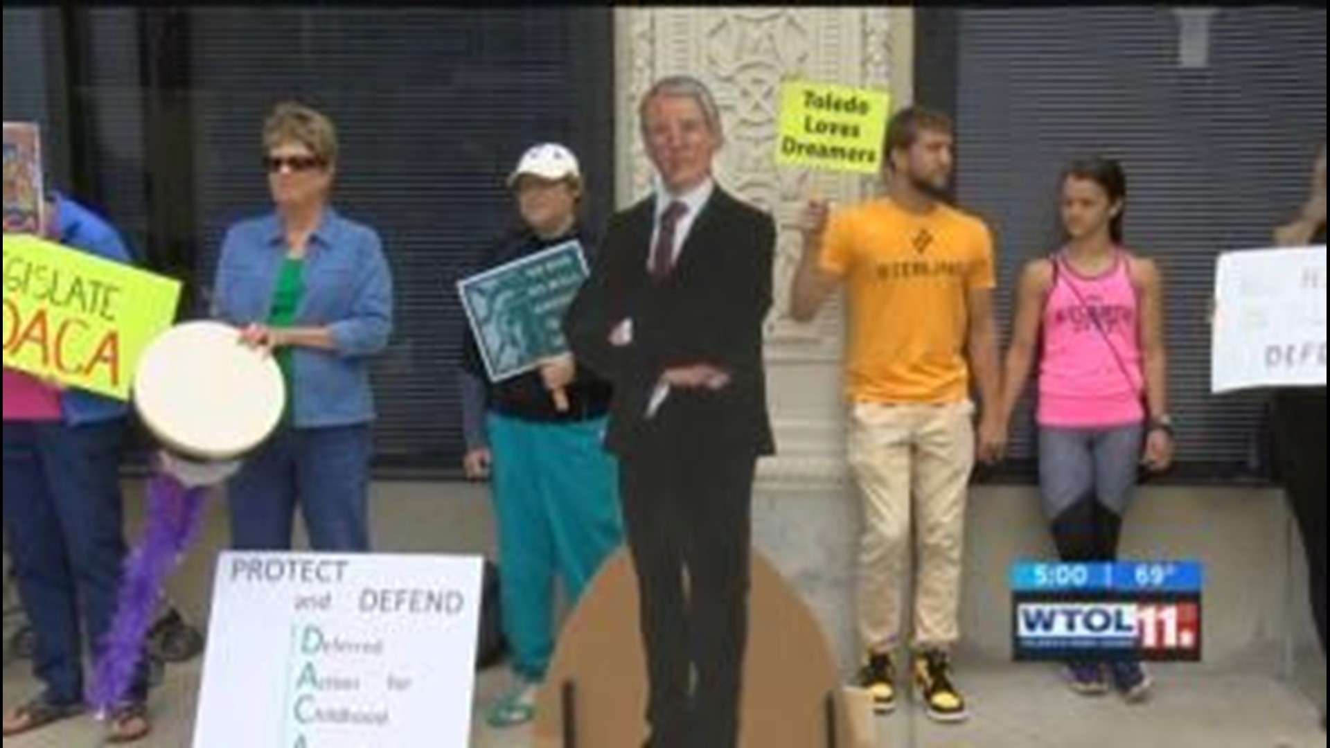 DACA supporters rally outside Sen. Portman's Toledo office