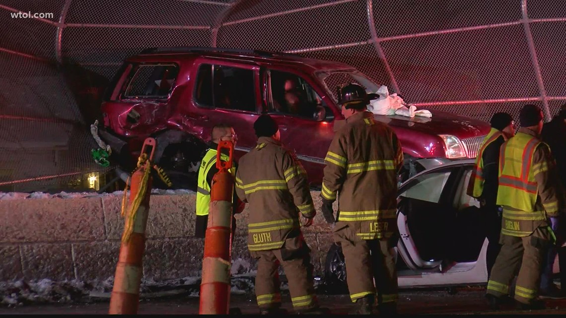 SUV embedded into Anthony Wayne Trail overpass fence after two vehicle ...