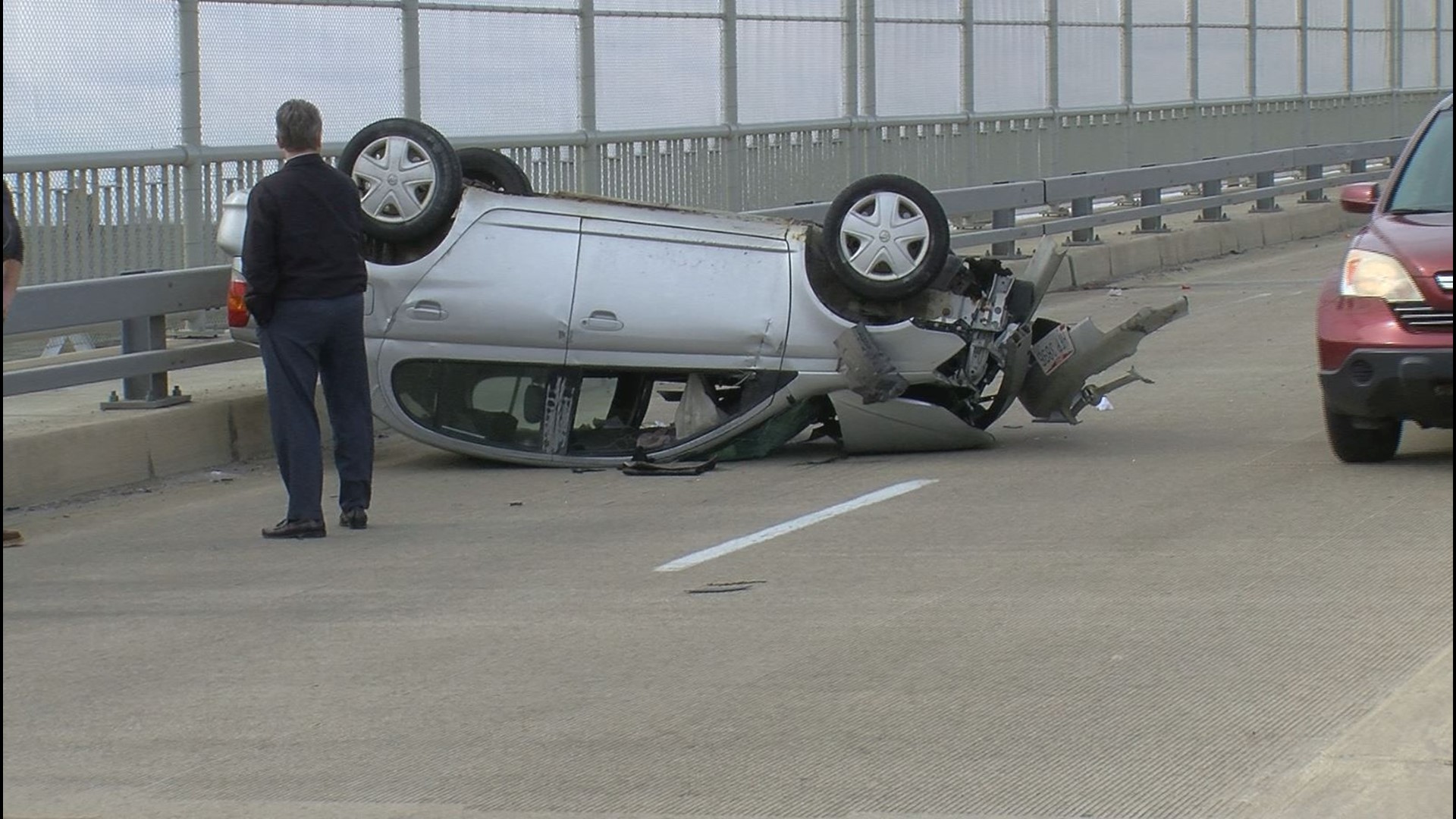 Car flips over on High Level Bridge