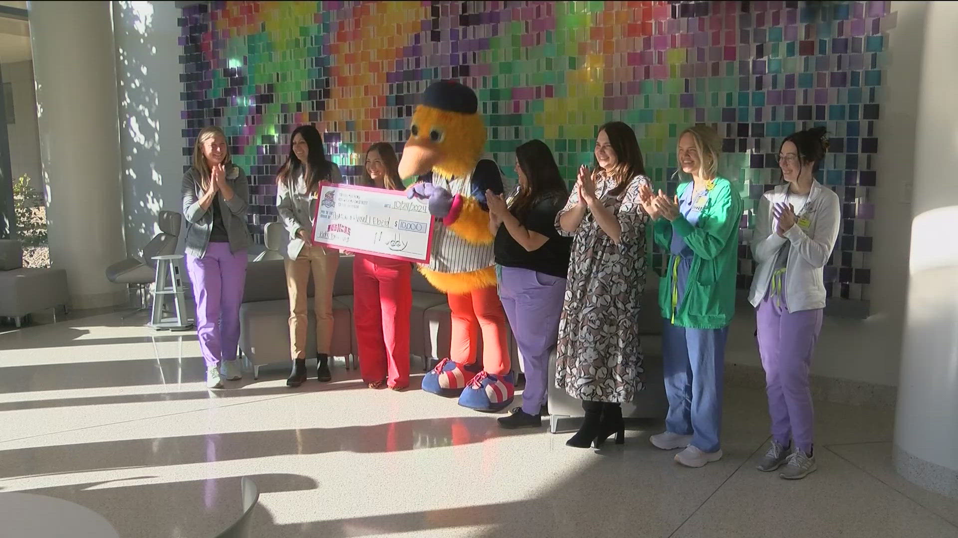 Muddy and the Toledo Mud Hens donated $10,000 to the Russel J. Ebeid Children's Hospital on Thursday. The donation comes from the team's Kids Takeover day.