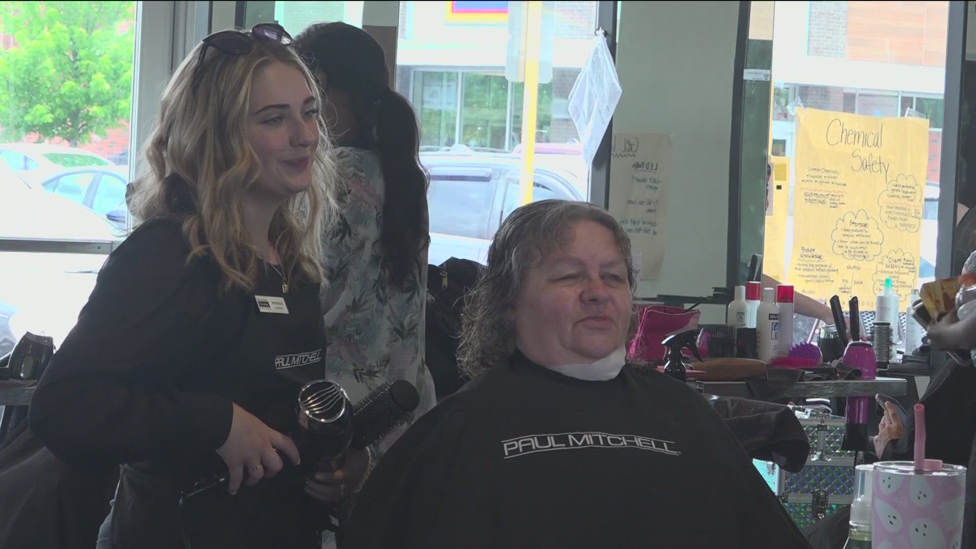 This is the 10th year that Paul Mitchell School salon has participated as a way to give back and make those fighting cancer feel a little better.