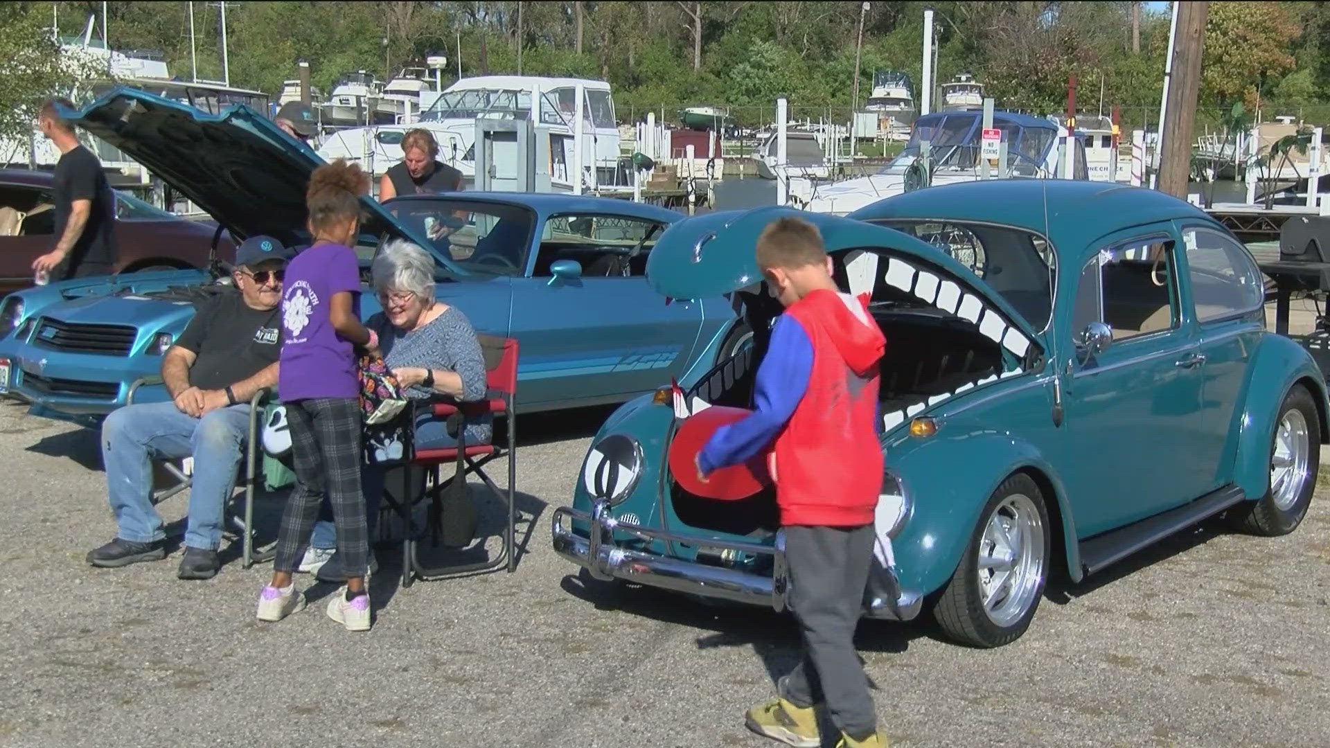 Before trunk or treating, the cars had a parade through Point Place.