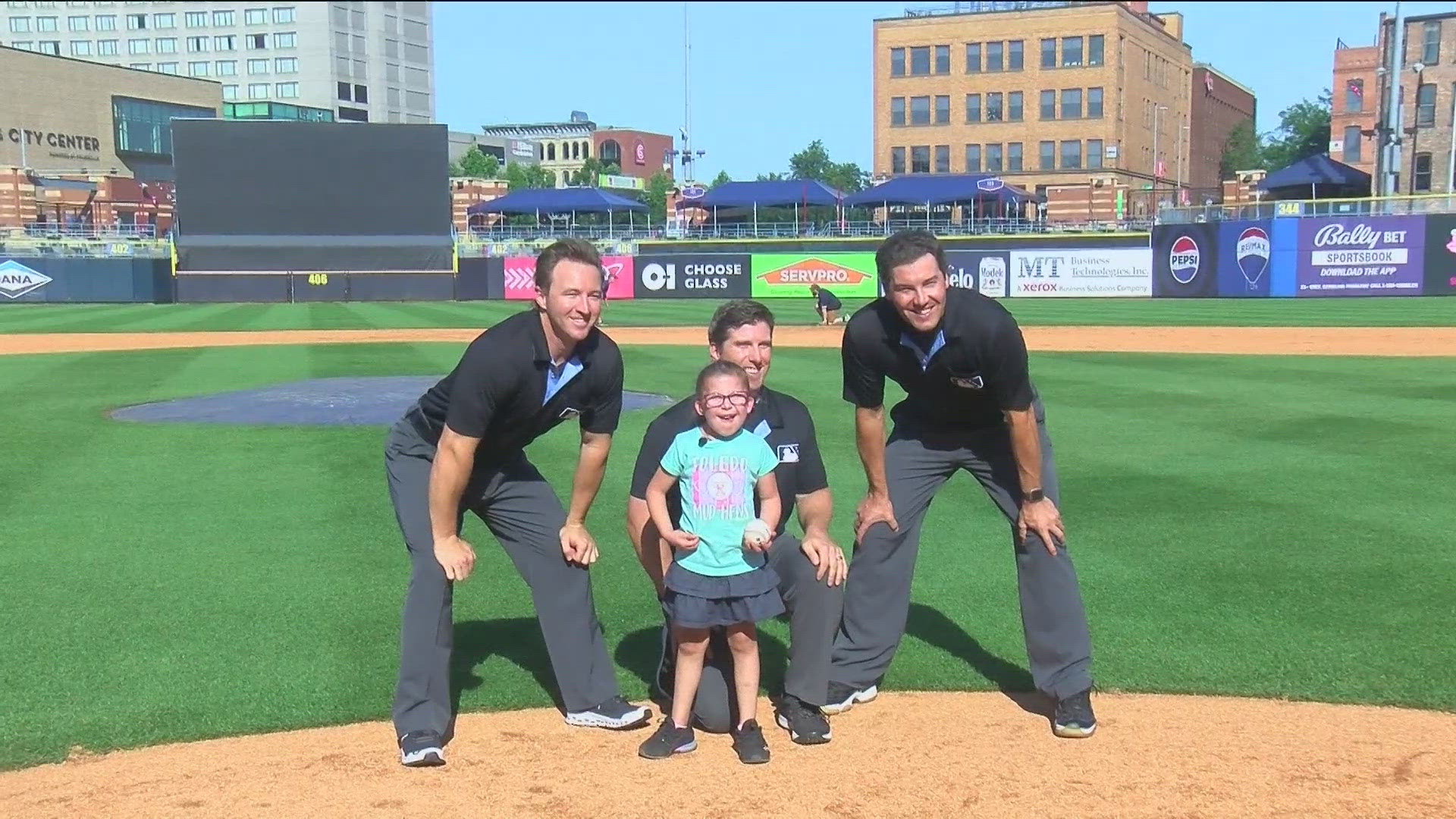 Emmalyn Rowan, 5, got a special behind-the-scenes tour of Fifth Third Field with its umpires. It's something her family wouldn't have imagined just a few years ago.