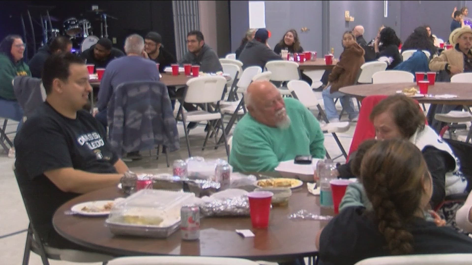 The leader of the church first gave back on the holiday when he was just 13 years old, and now he's doing it at his own church.