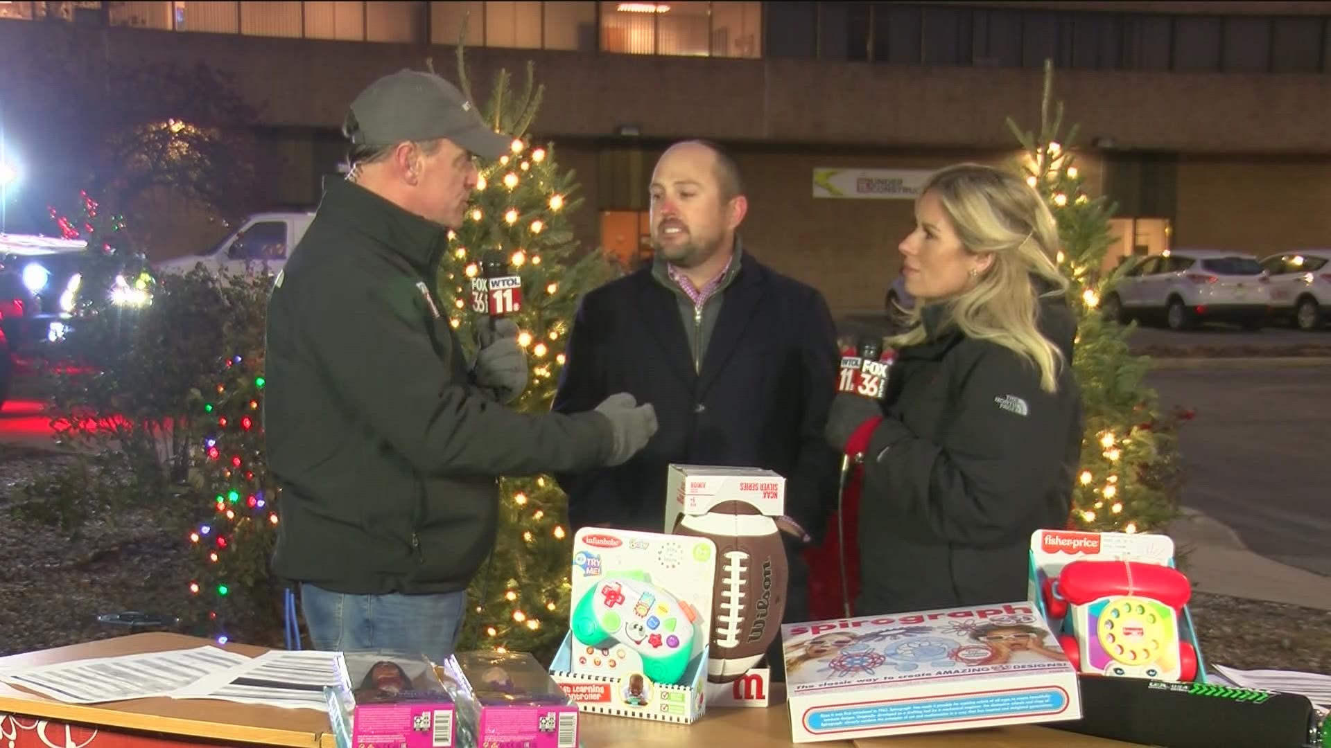 John Smythe, president of Habitec Security, talks with WTOL 11's Jeff Smith and Melissa Andrews about donating during Thursday's Gift of Joy event.