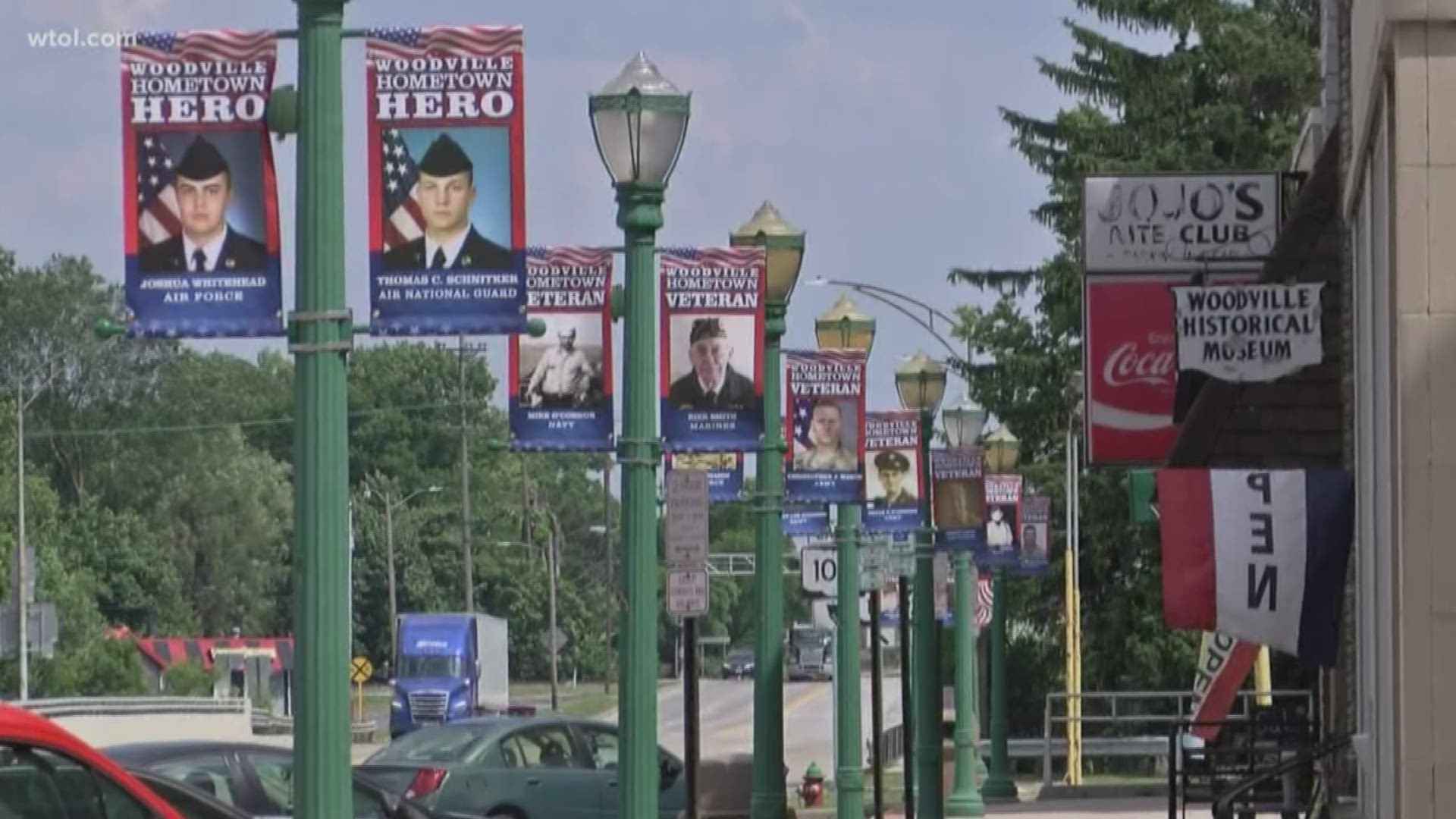 Village pays tribute to 'Hometown Heroes' on light posts up and down Main Street. There are 102 banners up to honor veterans.