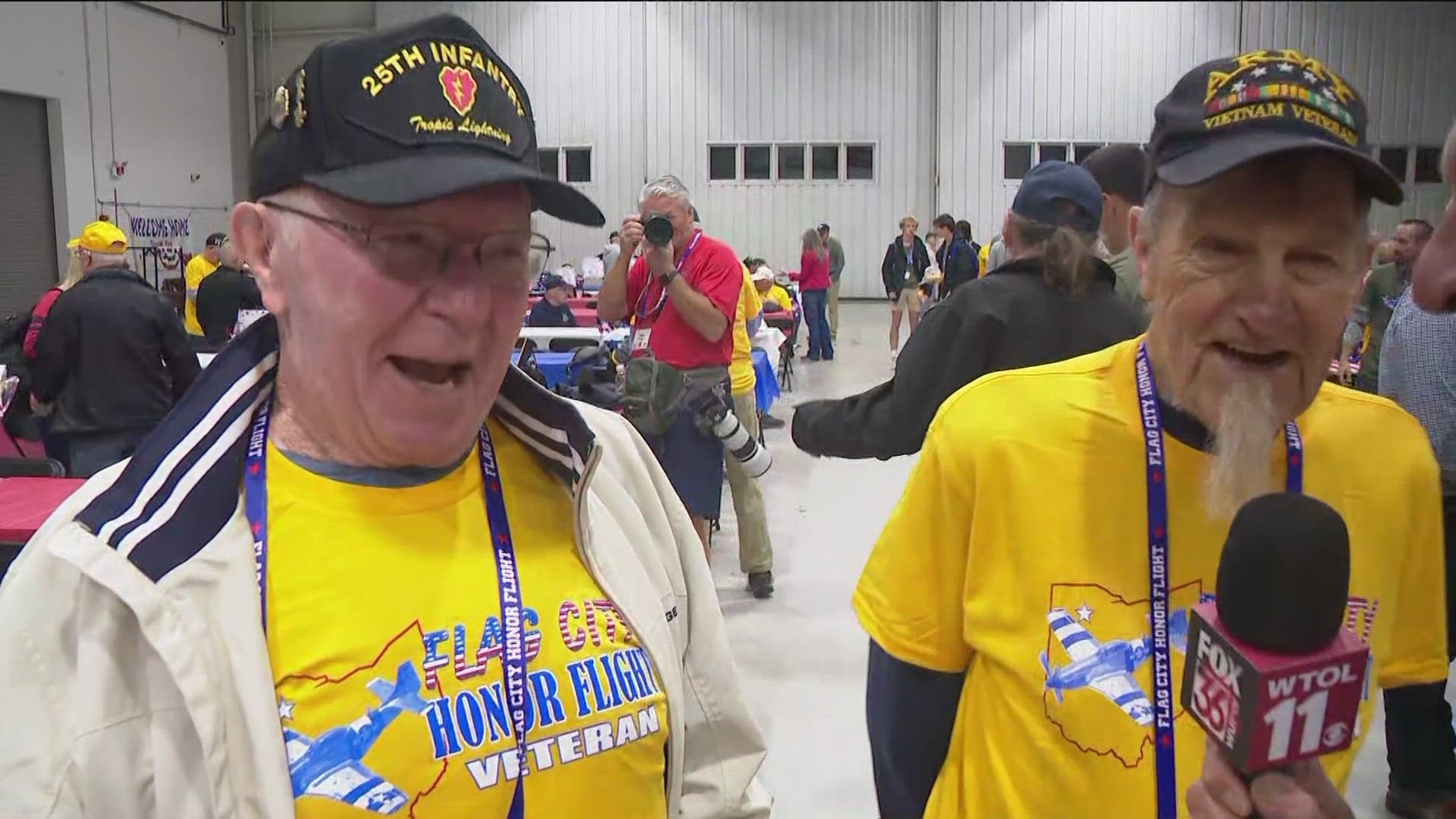 Dam Cummins chats with Peter Kennerk and Phillip Frager ahead of the first 2024 Flag City Honor Flight.