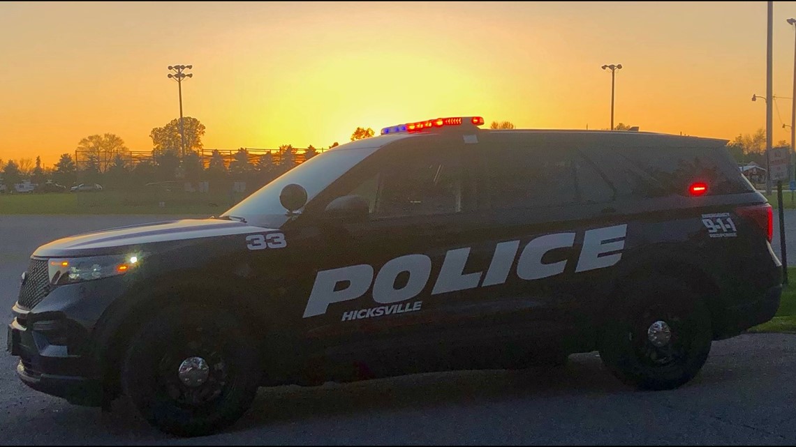 Hicksville police officers rescue man from burning house