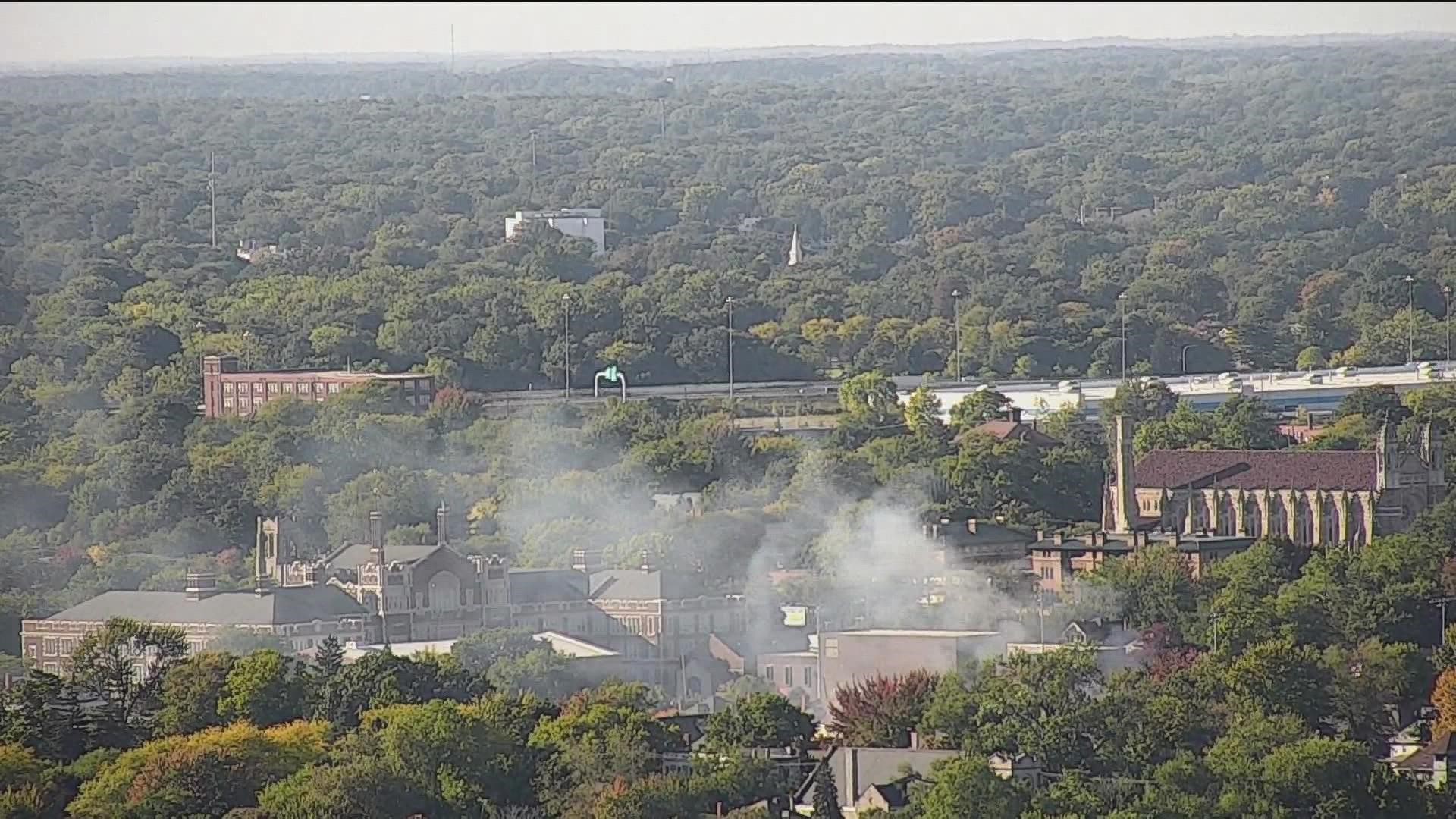 Toledo firefighters battled a blaze in a vacant house near Scott High School Monday.