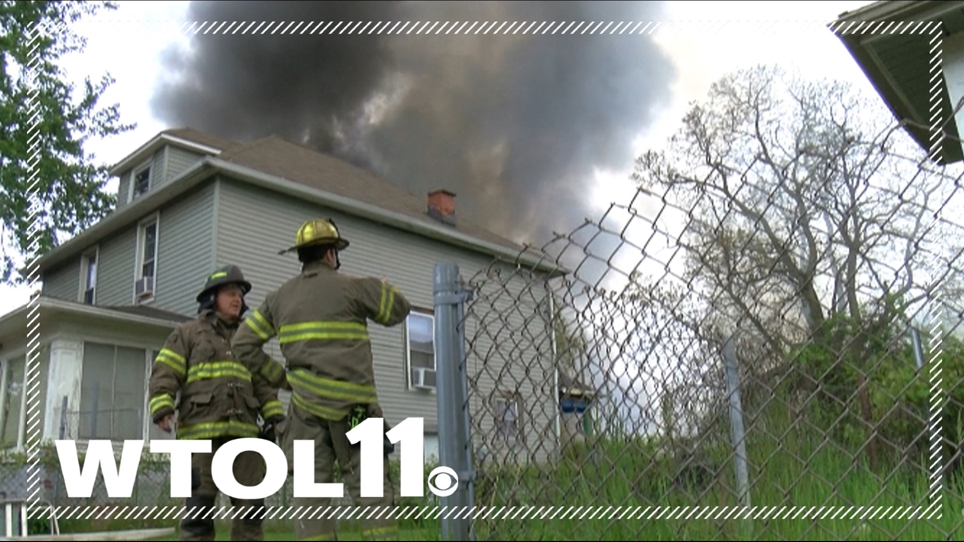 Smoke covered a neighborhood near E. Bancroft and Elm St. as firefighters battled a fire in a vacant warehouse on Sunday afternoon.