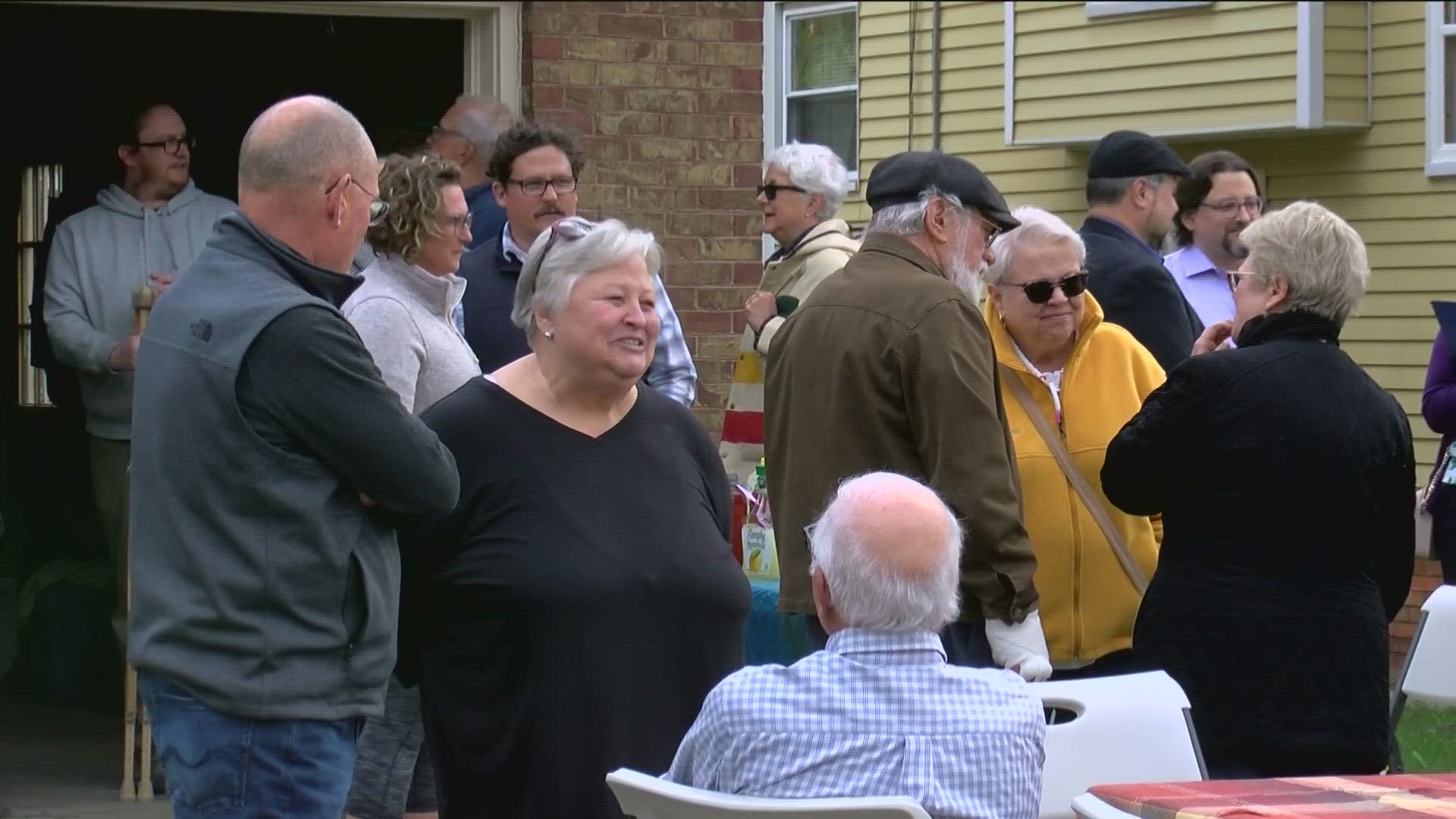 Neighbors, family and community members petitioned Toledo City Council to rename a south Toledo bridge in honor of philanthropist Dave Beckwith.