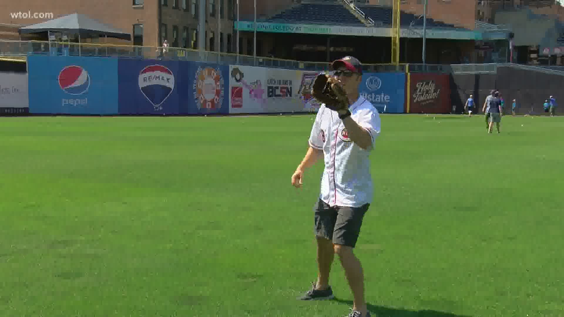 A home run of a gift for dad as they played catch in the outfield.