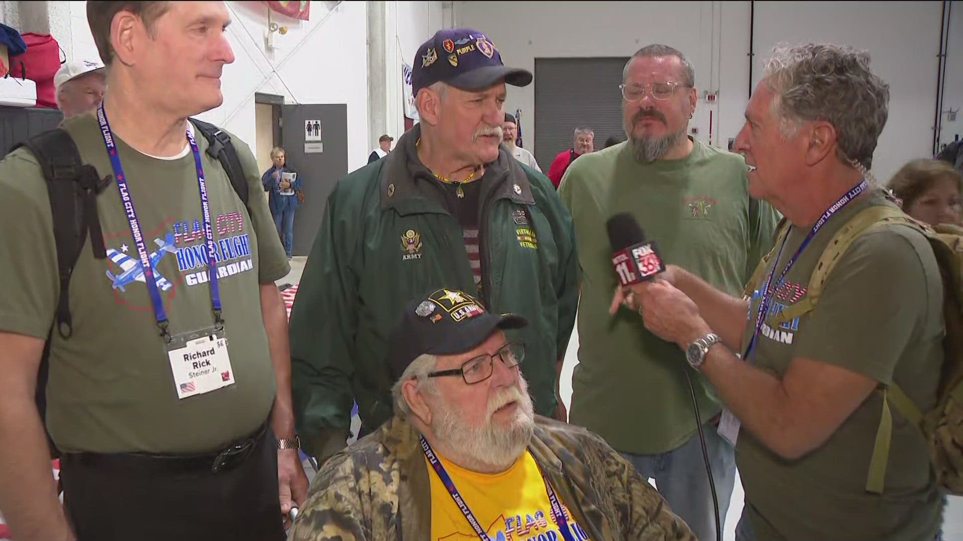 Dan Cummins chats with a pair of brothers who both served, including Butch Stewart, whose brother Bob enlisted in the Vietnam War so Butch wouldn't have to.