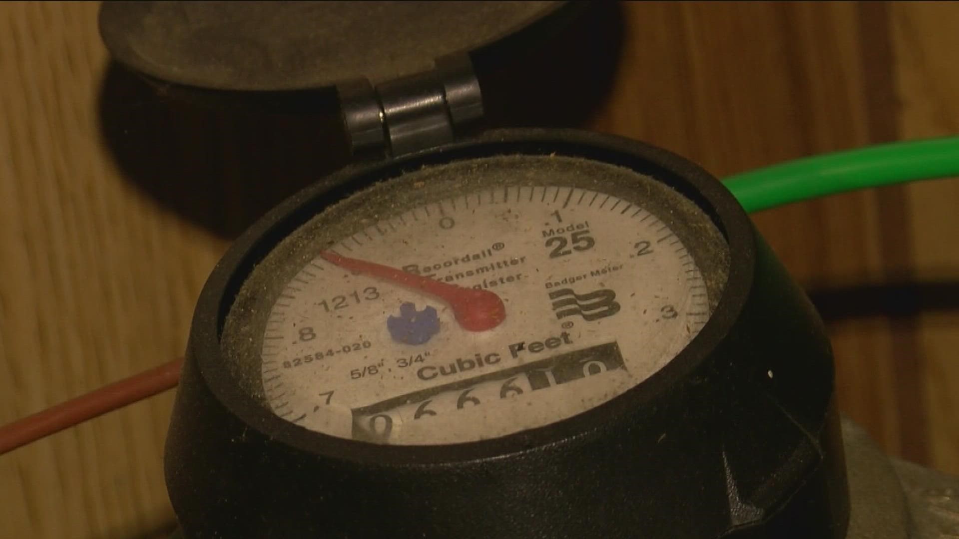 Toledo residents say the new water meters are not installed for free as promised.