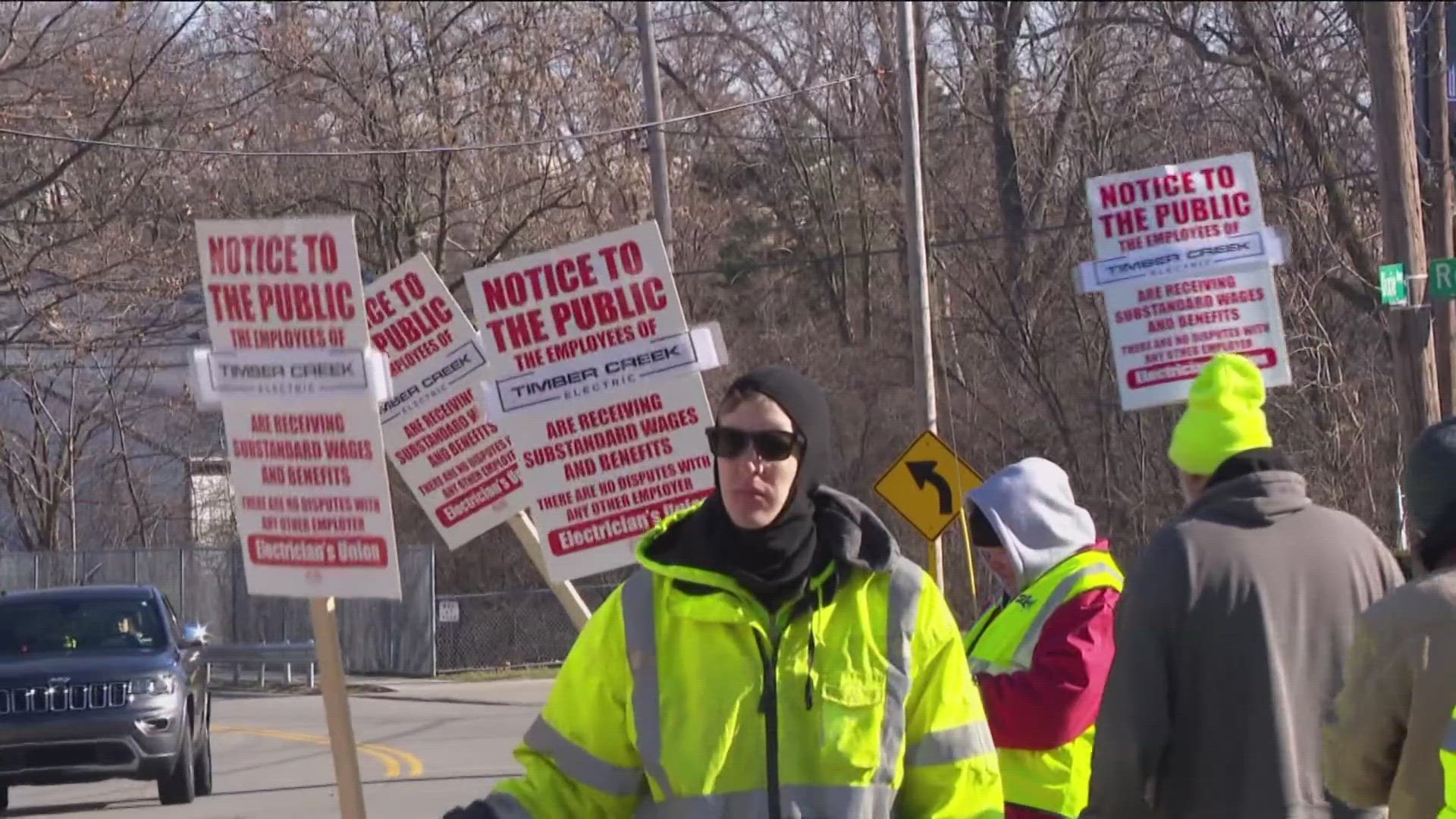 The IBEW Local 8 members held a silent protest outside the building because the new owners decided to hire a non-union electrical contractor.