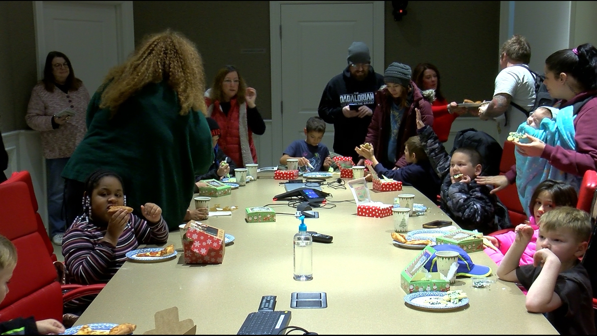 Fourteen kids each received a $150 gift card to spend on toys at the Walmart in Monroe.