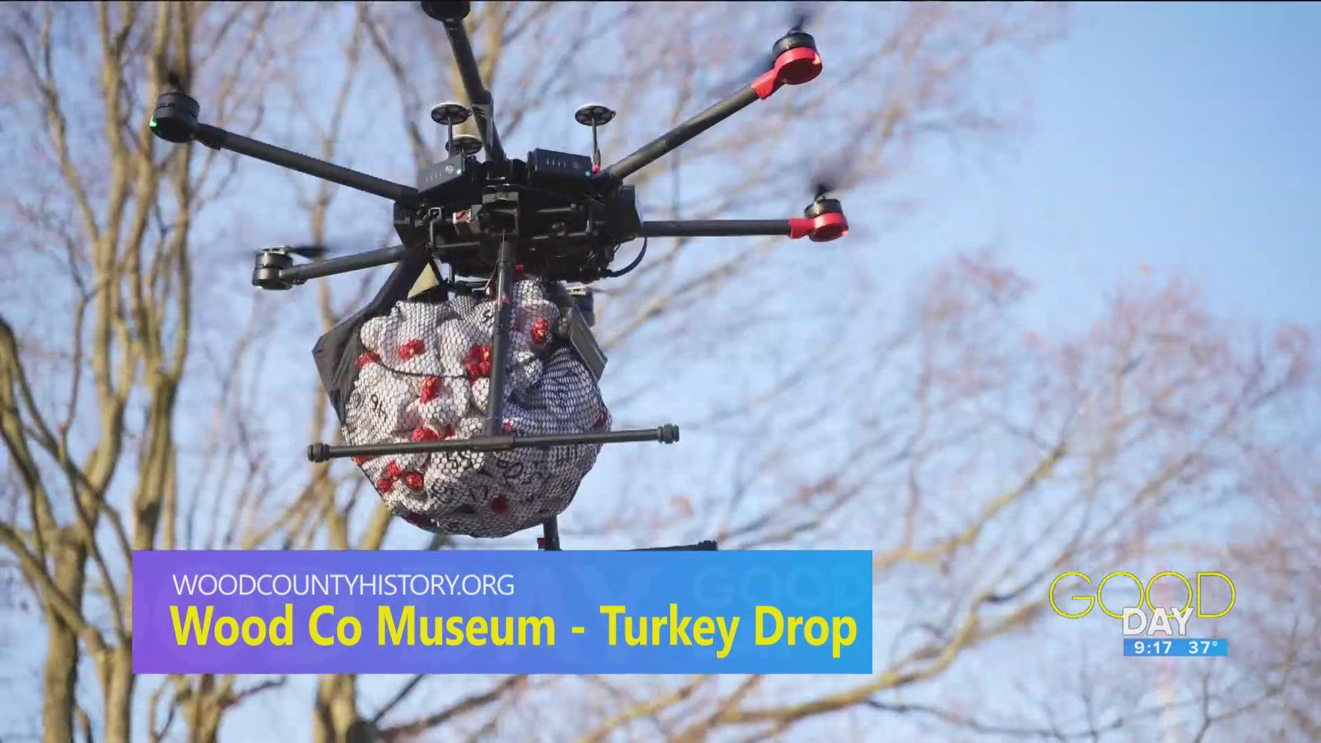 Annette Wells from the Wood County Museum and Chris Aldrich of Toledo Aerial Media talk the turkey drop. 