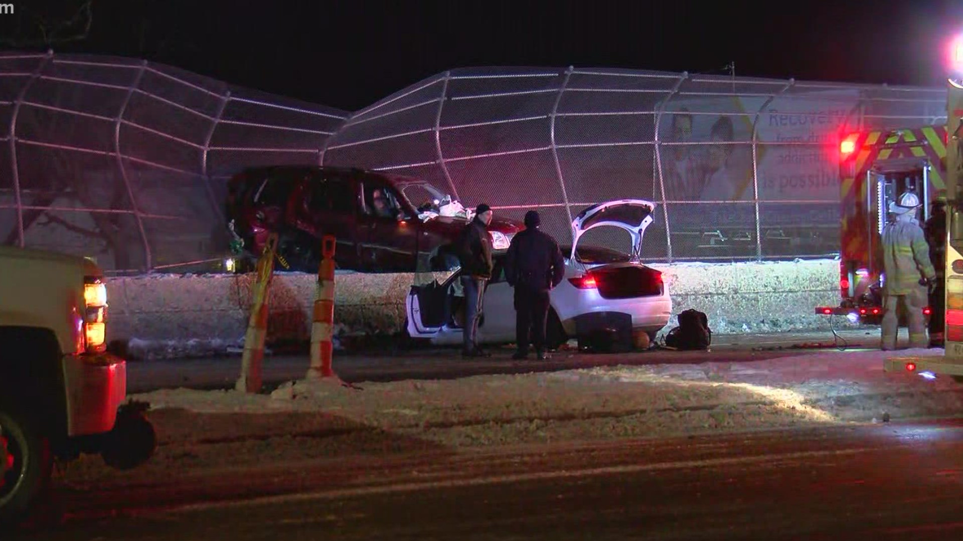 SUV embedded into Anthony Wayne Trail overpass fence after two vehicle ...