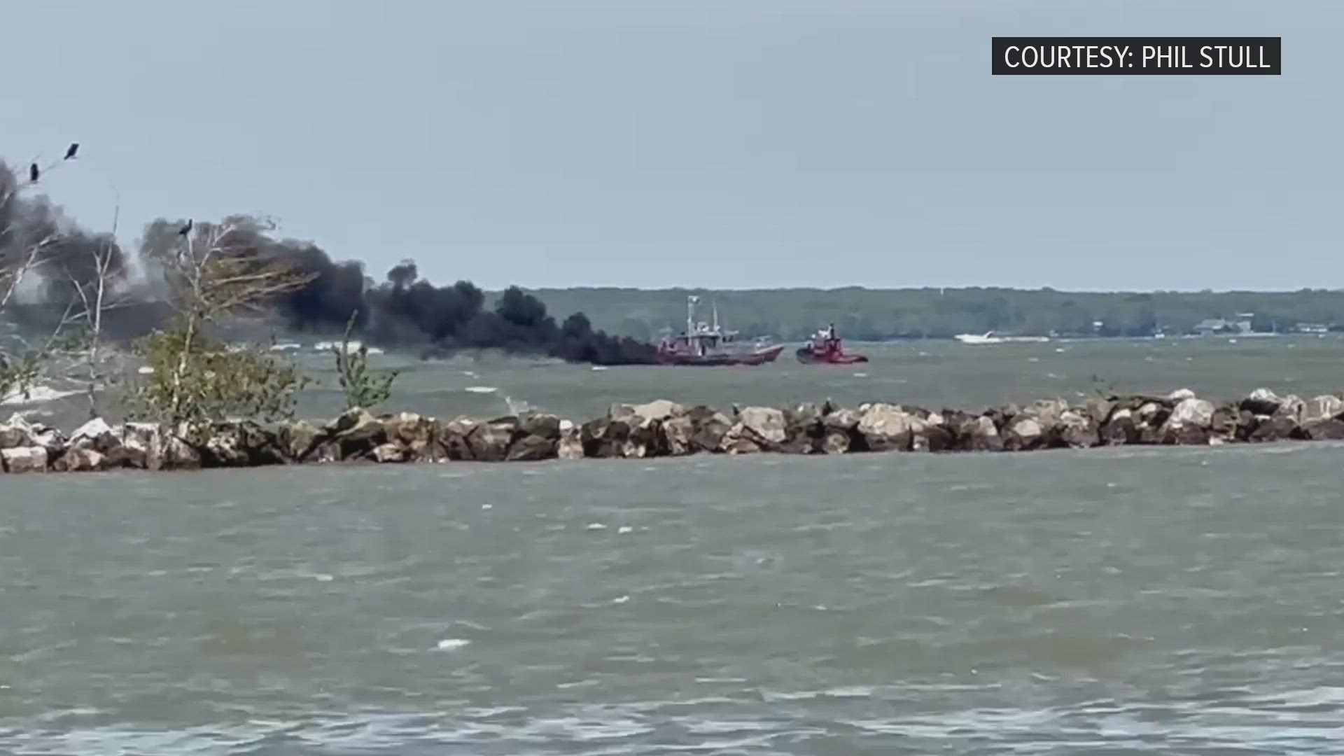 The U.S. Coast Guard says the 25' vessel became engulfed in flames on Sunday morning.