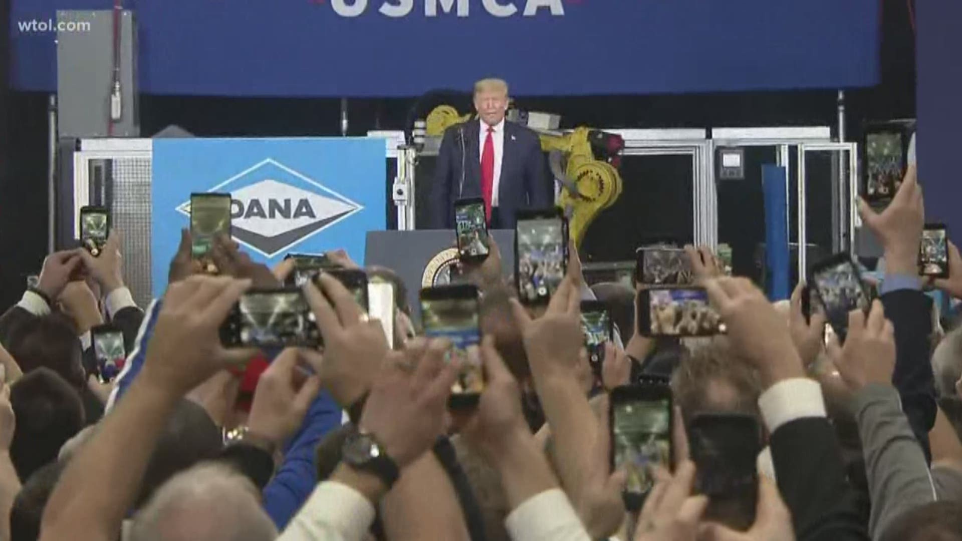 President Donald Trump celebrated signing a new trade agreement with Mexico and Canada by touring Dana, an auto supply manufacturing plant in Warren, Mich., Thursday