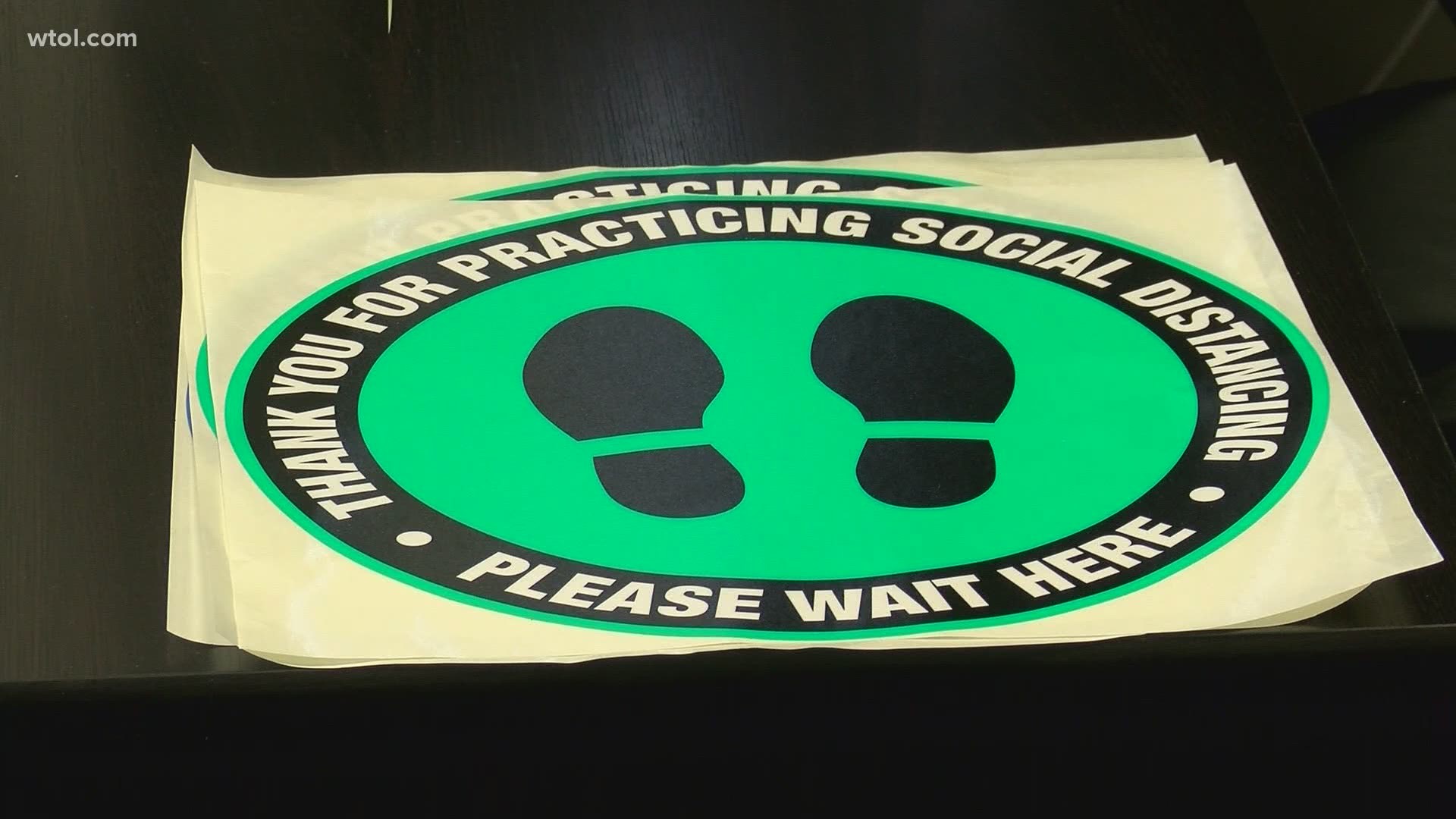 Social distancing has been made easier by floor markers and other types of labels made by Grace Imaging in Perrysburg.