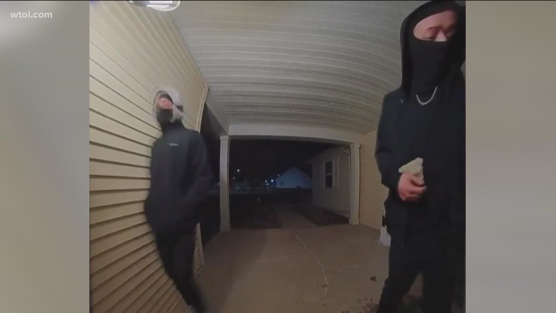 Police are searching for two men who broke into the home of a south Toledo woman Wednesday, threatening her with a rock and demanding money and jewelry.