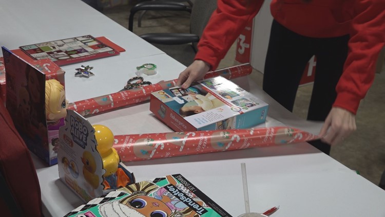 Toledo organization buys gifts for kids in need, honors veteran