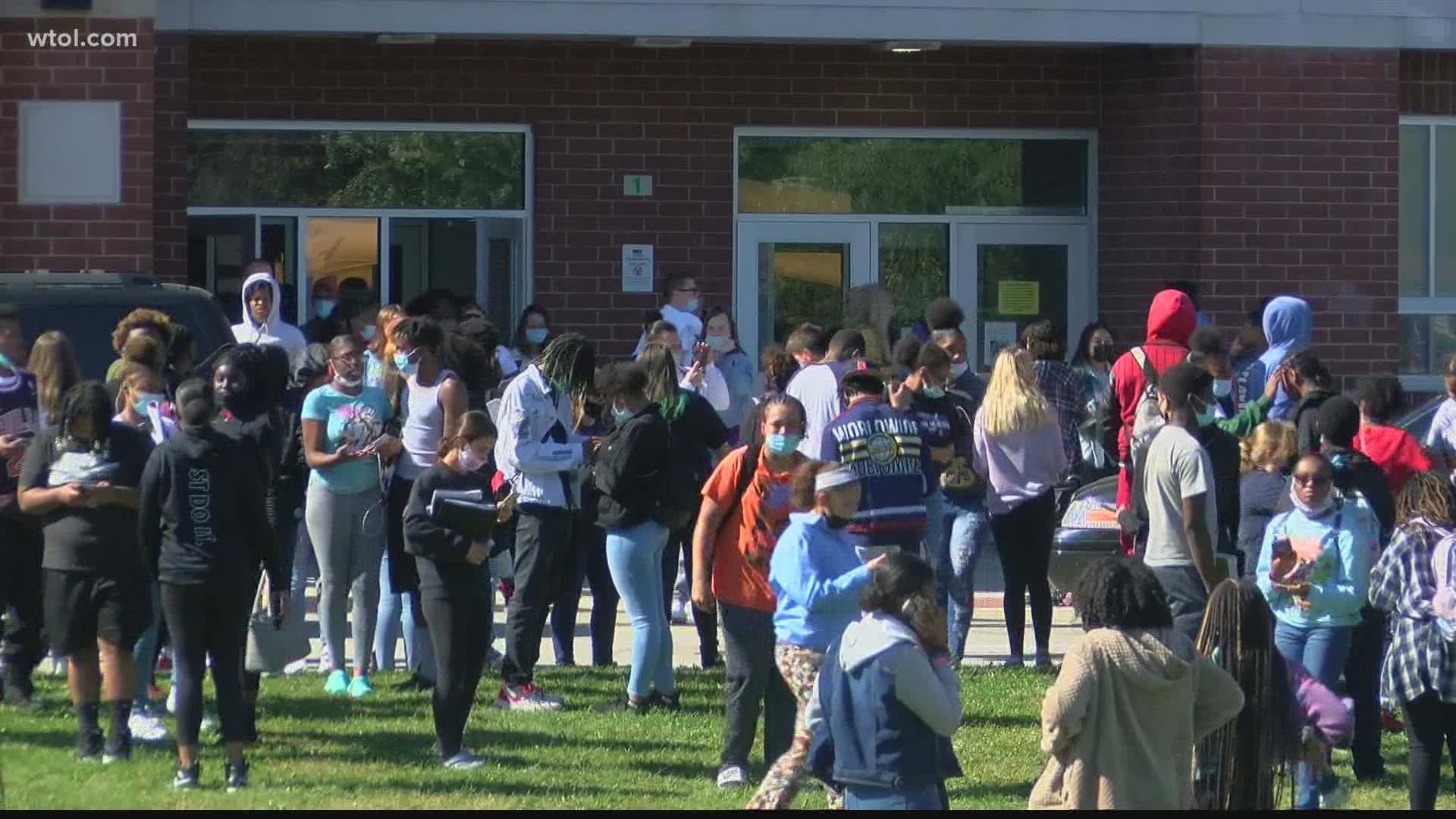 The school went on lockdown. No guns were found nor threats were made. The students are safe and left school on schedule.